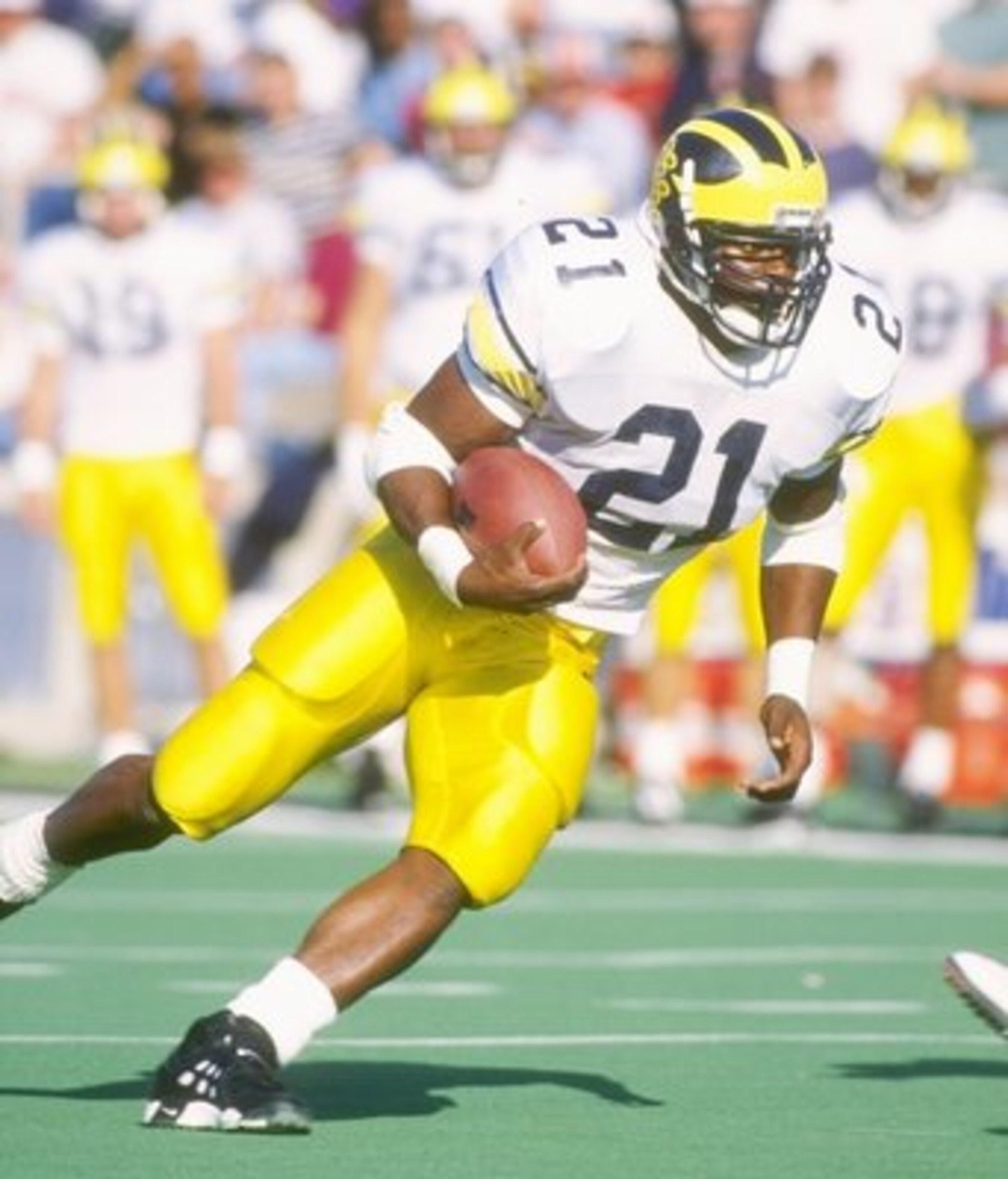 22 Oct 1994:  Running back Tim Biakabutaka of the Michigan Wolverines runs down the field during a game against the Illinois Fighting Illini at Memorial Stadium in Champaign, Illinios.  Michigan won the game 19-14. Mandatory Credit: Jonathan Daniel  /Alls