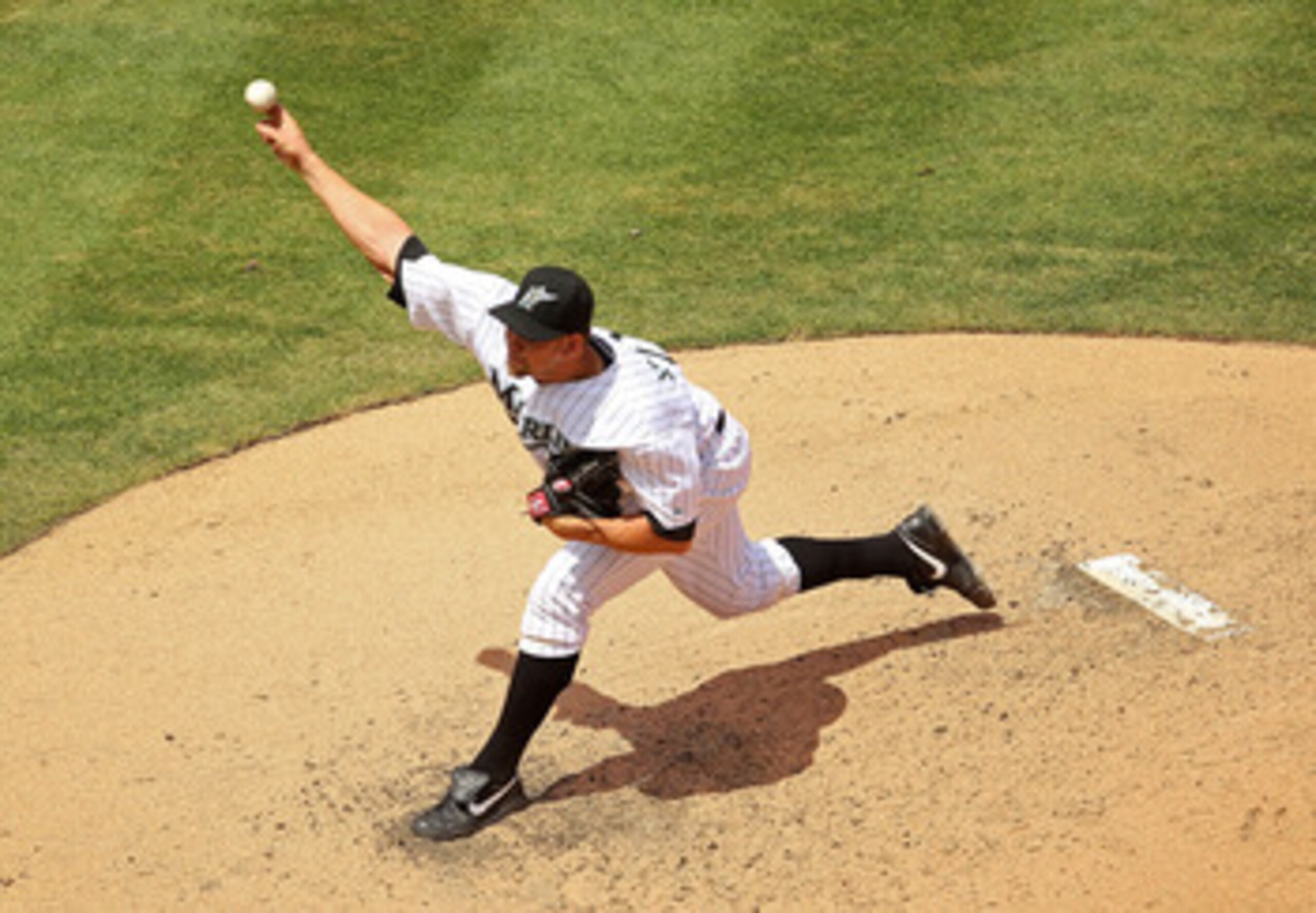 MIAMI GARDENS, FL - APRIL 24:  Josh Johnson #55 of the Florida Marlins pitches during a game against the Colorado Rockies at Sun Life Stadium on April 24, 2011 in Miami Gardens, Florida.  (Photo by Mike Ehrmann/Getty Images)