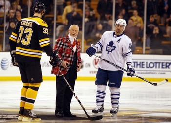 BOSTON - MARCH 04:  Don Cherry drops the puck during the ceremonial face off as Francois Beauchemin #22 of the Toronto Maple Leafs Zdeno Chara #33 of the Boston Bruins stand by on March 4, 2010 at the TD Garden in Boston, Massachusetts.  (Photo by Elsa/Ge