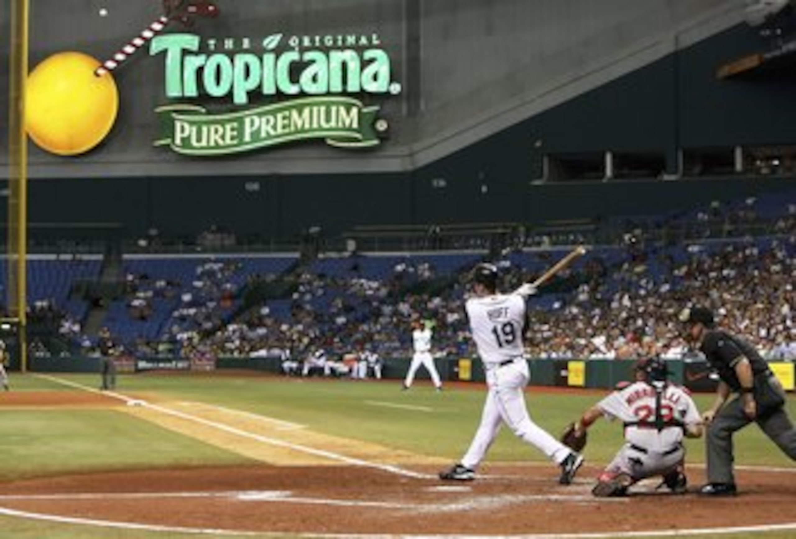 ST. PETERSBURG, FL - JULY 06:  Aubrey Huff #19 of the Tampa Bay Devil Rays hits a solo home run in the 4th inning against the Boston Red Sox at Tropicana Field on July 6, 2006 in St. Petersburg, Florida.  (Photo by Doug Benc/Getty Images)