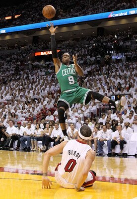 MIAMI, FL - MAY 01:  Rajon Rondo #9 of the Boston Celtics shoots over Mike Bibby #0 of the Miami Heat during Game One of the Eastern Conference Semifinals of the 2011 NBA Playoffs at American Airlines Arena on May 1, 2011 in Miami, Florida. NOTE TO USER: 
