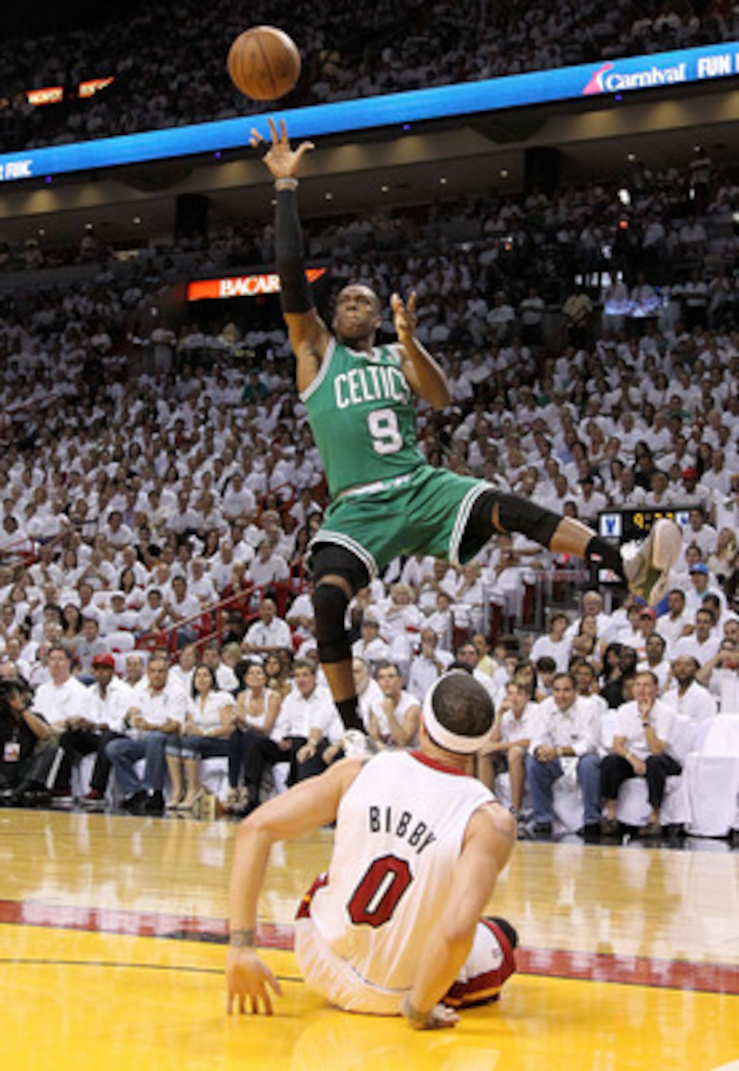 MIAMI, FL - MAY 01: Rajon Rondo #9 of the Boston Celtics shoots over Mike Bibby #0 of the Miami Heat during Game One of the Eastern Conference Semifinals of the 2011 NBA Playoffs at American Airlines Arena on May 1, 2011 in Miami, Florida. NOTE TO USER: MIAMI, FL - MAY 01: Rajon Rondo #9 of the Boston Celtics shoots over Mike Bibby #0 of the Miami Heat during Game One of the Eastern Conference Semifinals of the 2011 NBA Playoffs at American Airlines Arena on May 1, 2011 in Miami, Florida. NOTE TO USER: