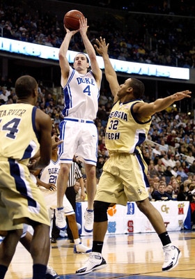 WASHINGTON - MARCH 13:  J.J. Redick #4 of the Duke Blue Devils puts up a jump shot over Jeremis Smith #32 of the Georgia Tech Yellow Jackets during the ACC Tournament Championship Game against the Georgia Tech Yellow Jackets on March 13, 2005 at the MCI C