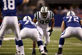 INDIANAPOLIS, IN - JANUARY 08:  Linebacker Jason Taylor #99 of the New York Jets lines up on defense against the Indianapolis Colts during their 2011 AFC wild card playoff game at Lucas Oil Stadium on January 8, 2011 in Indianapolis, Indiana. The Jets won