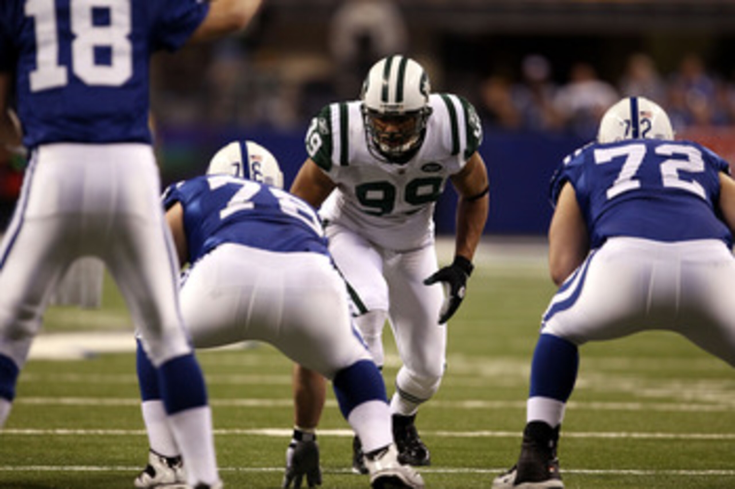 INDIANAPOLIS, IN - JANUARY 08:  Linebacker Jason Taylor #99 of the New York Jets lines up on defense against the Indianapolis Colts during their 2011 AFC wild card playoff game at Lucas Oil Stadium on January 8, 2011 in Indianapolis, Indiana. The Jets won