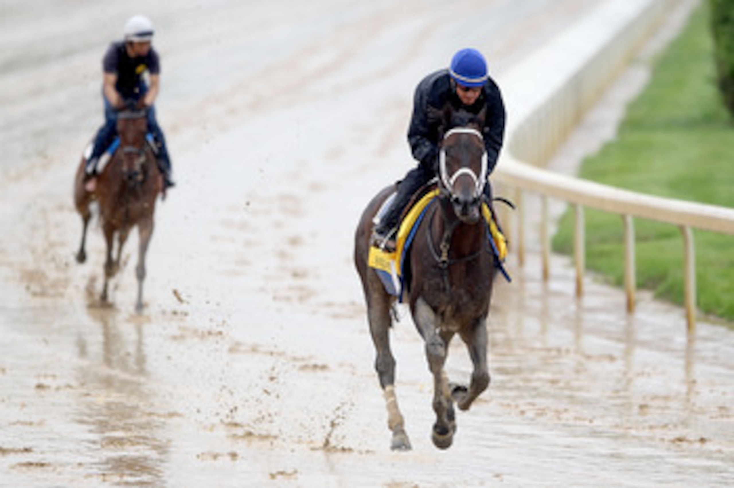 LOUISVILLE, KY - MAY 02:  Soldat (R) runs during the morning exercise session in preparation for the 137th Kentucky Derby at Churchill Downs on May 2, 2011 in Louisville, Kentucky.  (Photo by Matthew Stockman/Getty Images)