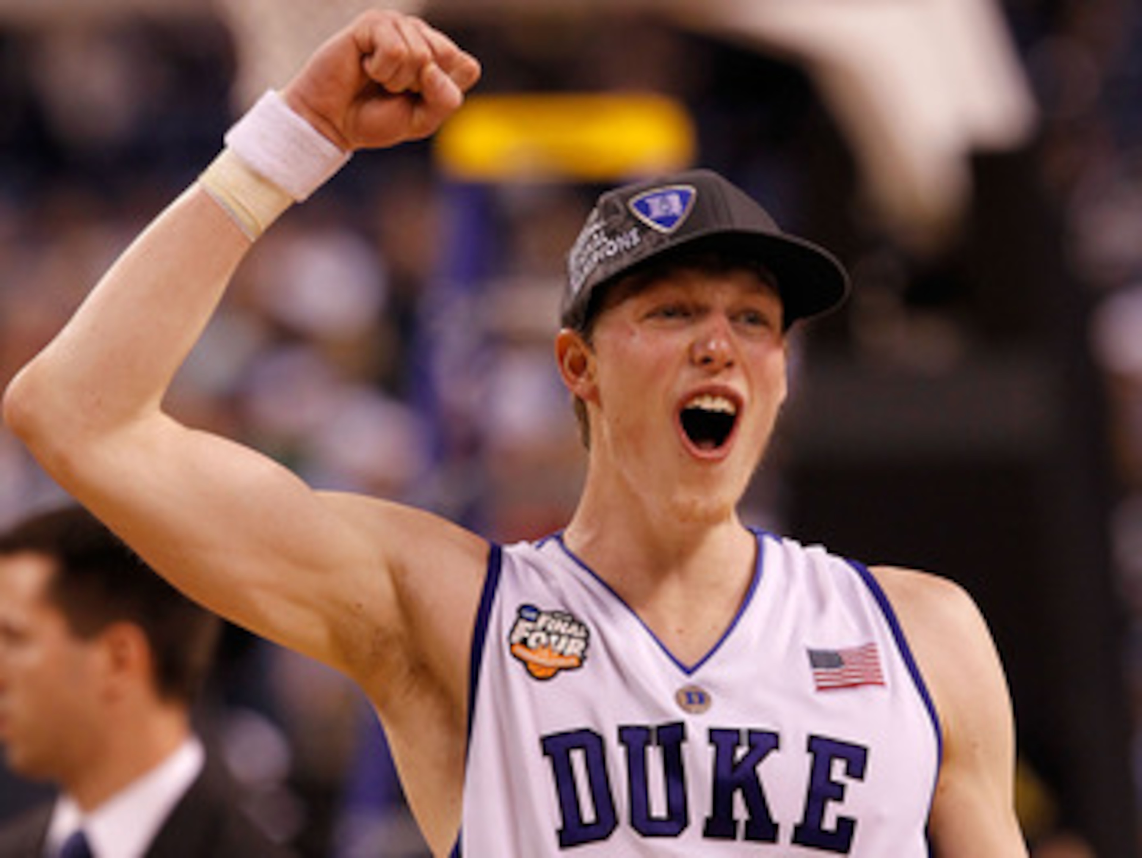 INDIANAPOLIS - APRIL 05: Kyle Singler #12 of the Duke Blue Devils celebrates their 61-59 win against the Butler Bulldogs during the 2010 NCAA Division I Men's Basketball National Championship game at Lucas Oil Stadium on April 5, 2010 in Indianapolis, In INDIANAPOLIS - APRIL 05: Kyle Singler #12 of the Duke Blue Devils celebrates their 61-59 win against the Butler Bulldogs during the 2010 NCAA Division I Men's Basketball National Championship game at Lucas Oil Stadium on April 5, 2010 in Indianapolis, In