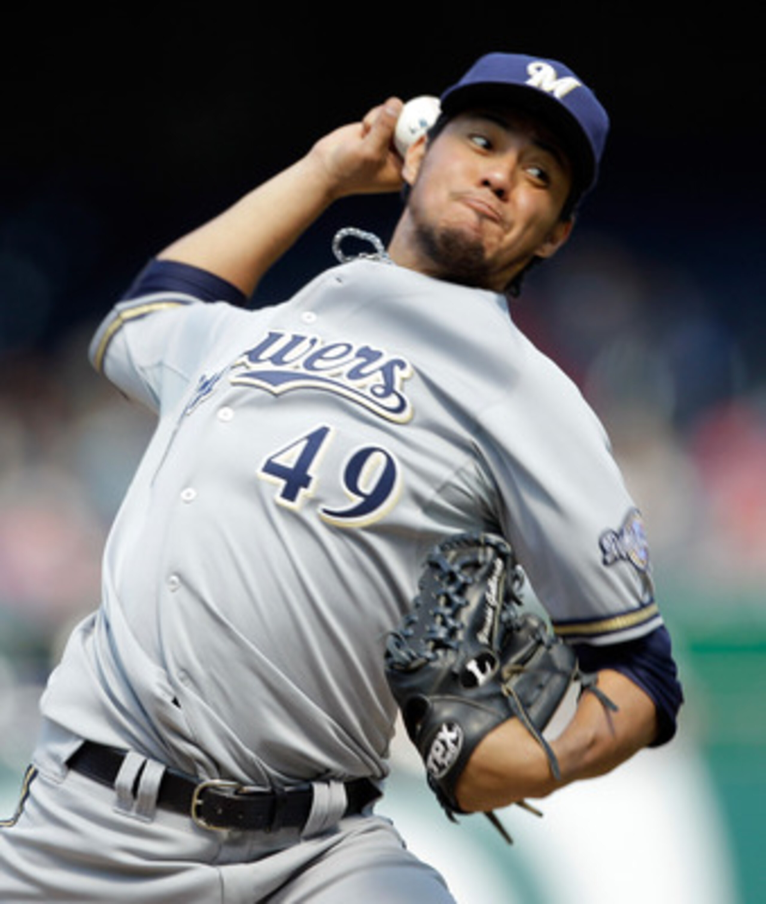WASHINGTON, DC - APRIL 17: Pitcher Yovani Gallardo #49 of the Milwaukee Brewers delivers to a Washington Nationals batter at Nationals Park on April 17, 2011 in Washington, DC.  (Photo by Rob Carr/Getty Images)