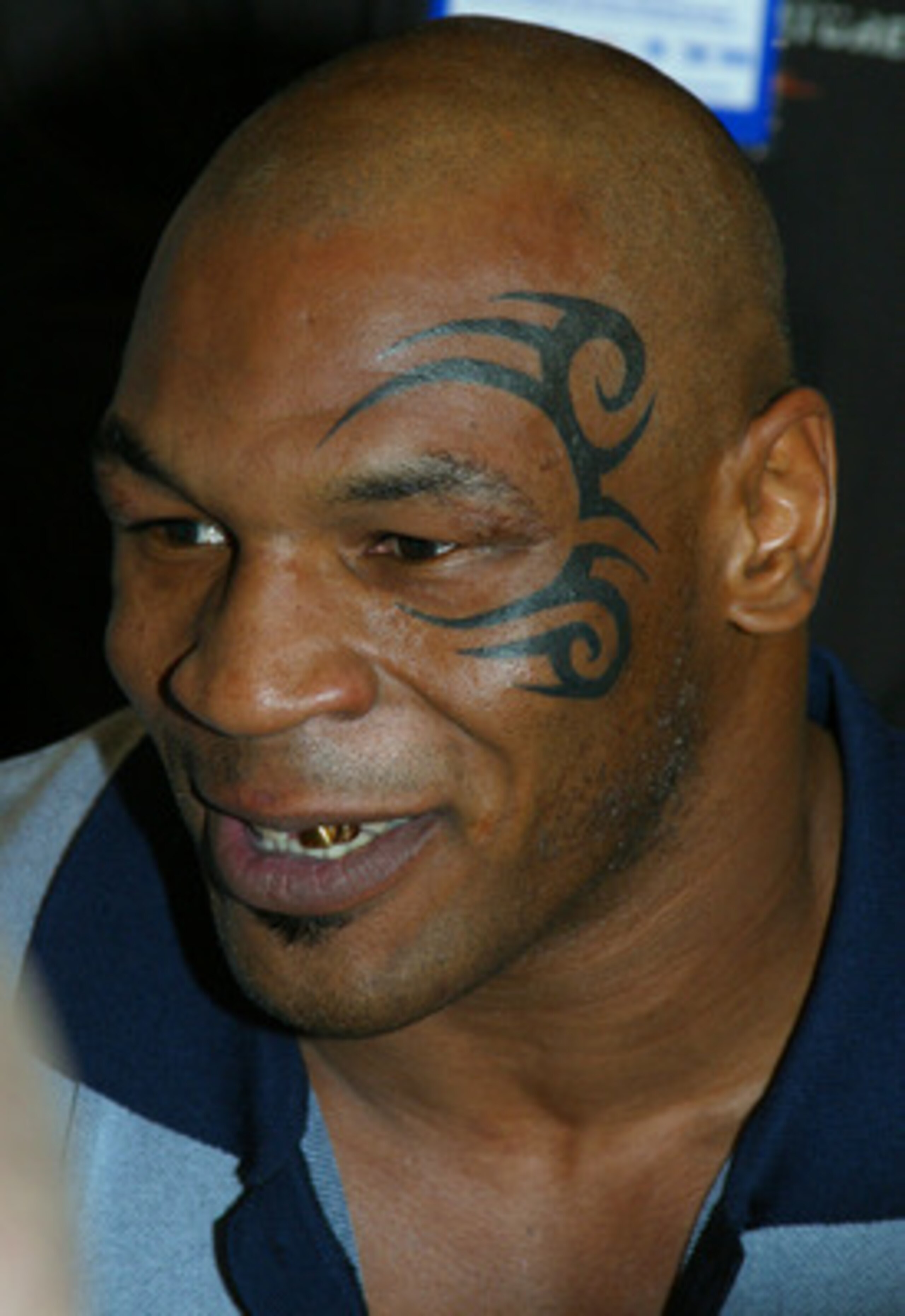 MEMPHIS, TN - FEBRUARY 20 :  Mike Tyson shows off his tattoo on his face on February 20, 2003 at his press conference for his fight against Clifford Etienne in Memphis, Tennessee. (Photo by Tom Casino/Getty Images)