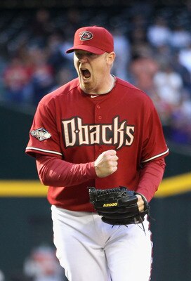 PHOENIX, AZ - APRIL 10:  Relief pitcher J.J. Putz #40 of the Arizona Diamondbacks celebrates after defeating the Cincinnati Reds in the Major League Baseball game at Chase Field on April 10, 2011 in Phoenix, Arizona. The Diamondbacks defeated the Reds 10-