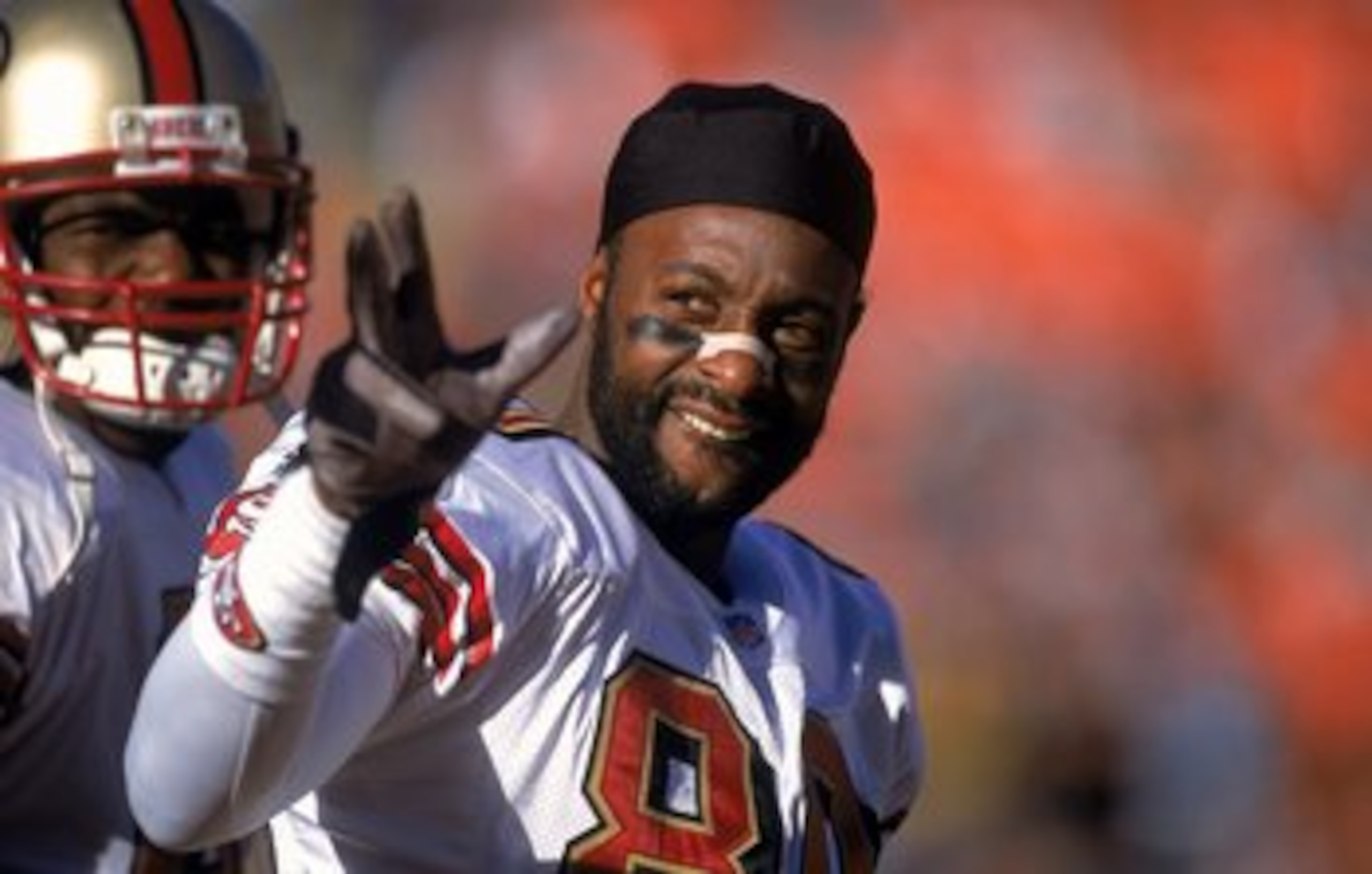 23 Dec 2000:  Jerry Rice #80 of the San Francisco 49ers waves to his fans during the game against the Denver Broncos at the Mile High Stadium in Denver, Colorado. The Broncos defeated the 49ers 38-9.Mandatory Credit: Harry How  /Allsport