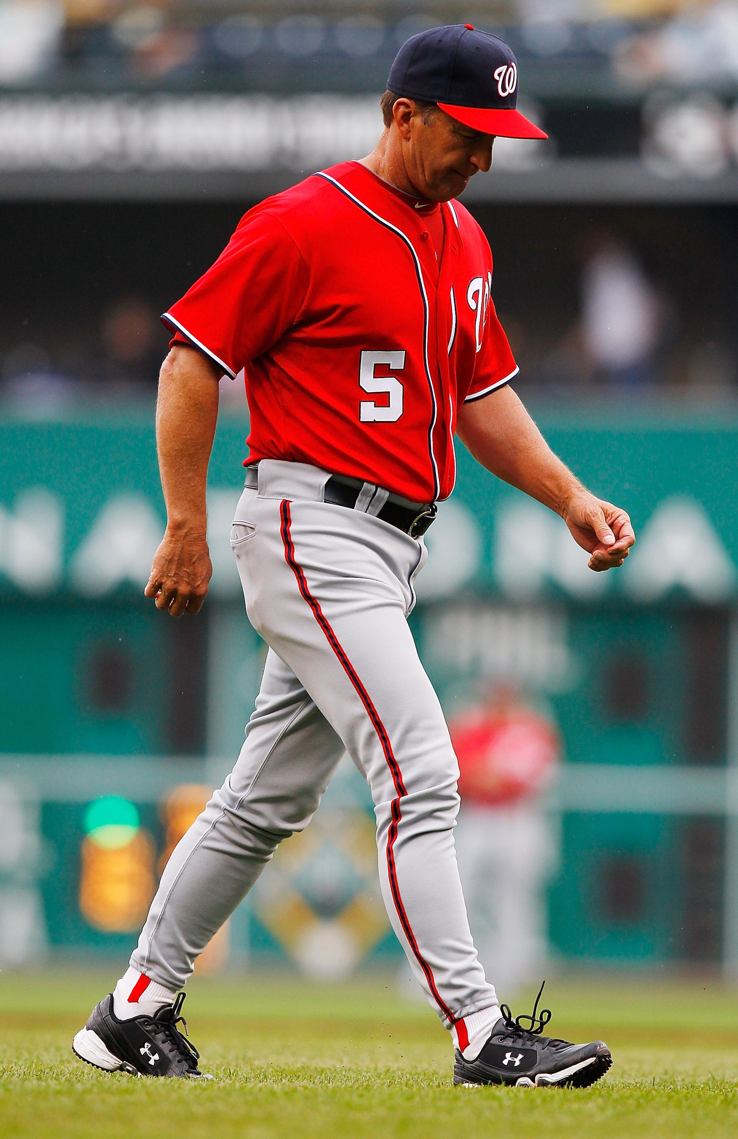 PITTSBURGH - APRIL 24:  Manager Jim Rigglema of the Washington Nationals walks back to the dugout during the game against the Pittsburgh Pirates on April 24, 2011 at PNC Park in Pittsburgh, Pennsylvania.  (Photo by Jared Wickerham/Getty Images)