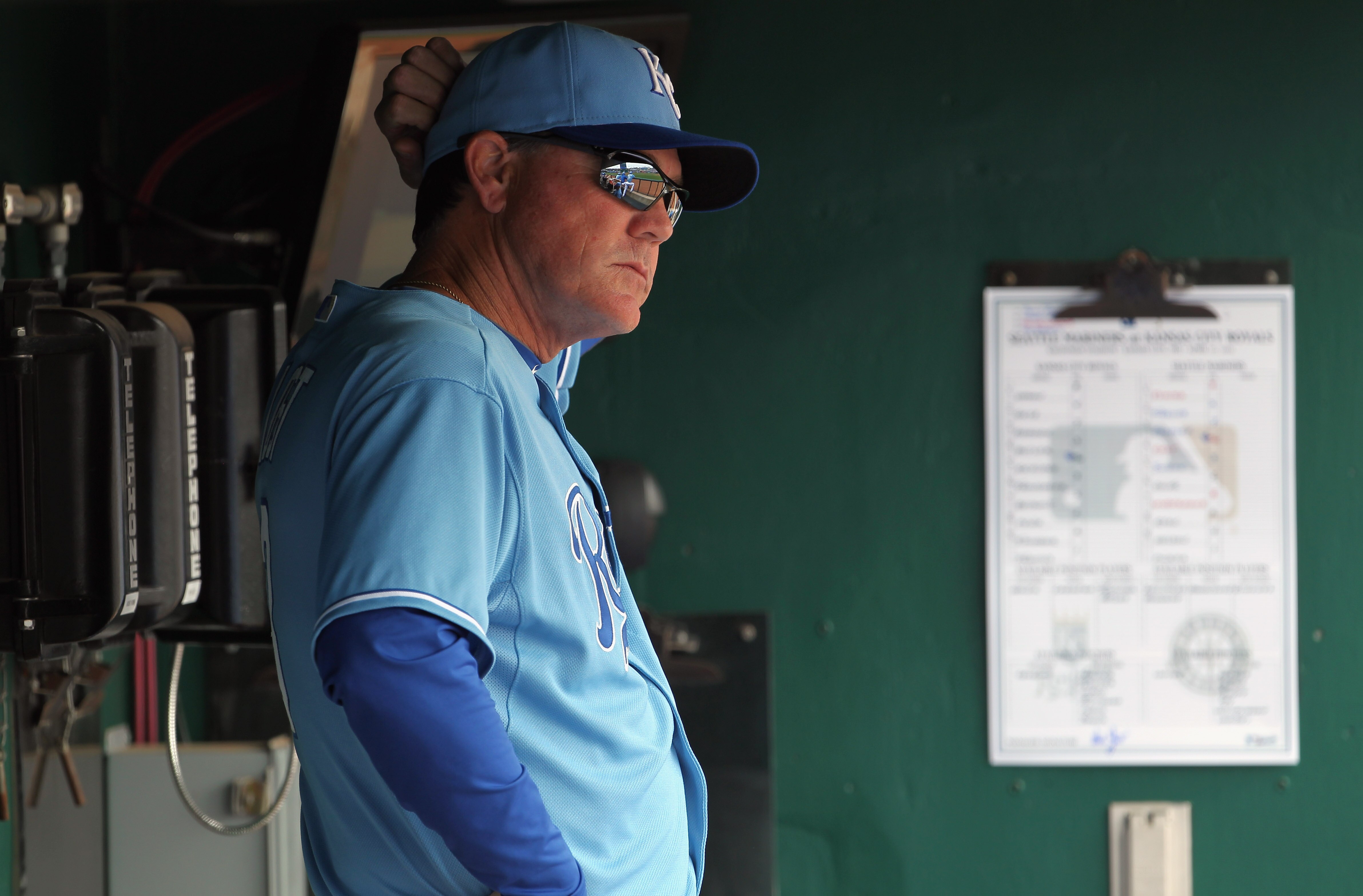 KANSAS CITY, MO - APRIL 17:  Manager Ned Yost #3 of the Kansas City Royals watches from the dugout during the game against the Seattle Mariners on April 17, 2011 at Kauffman Stadium in Kansas City, Missouri.  (Photo by Jamie Squire/Getty Images)