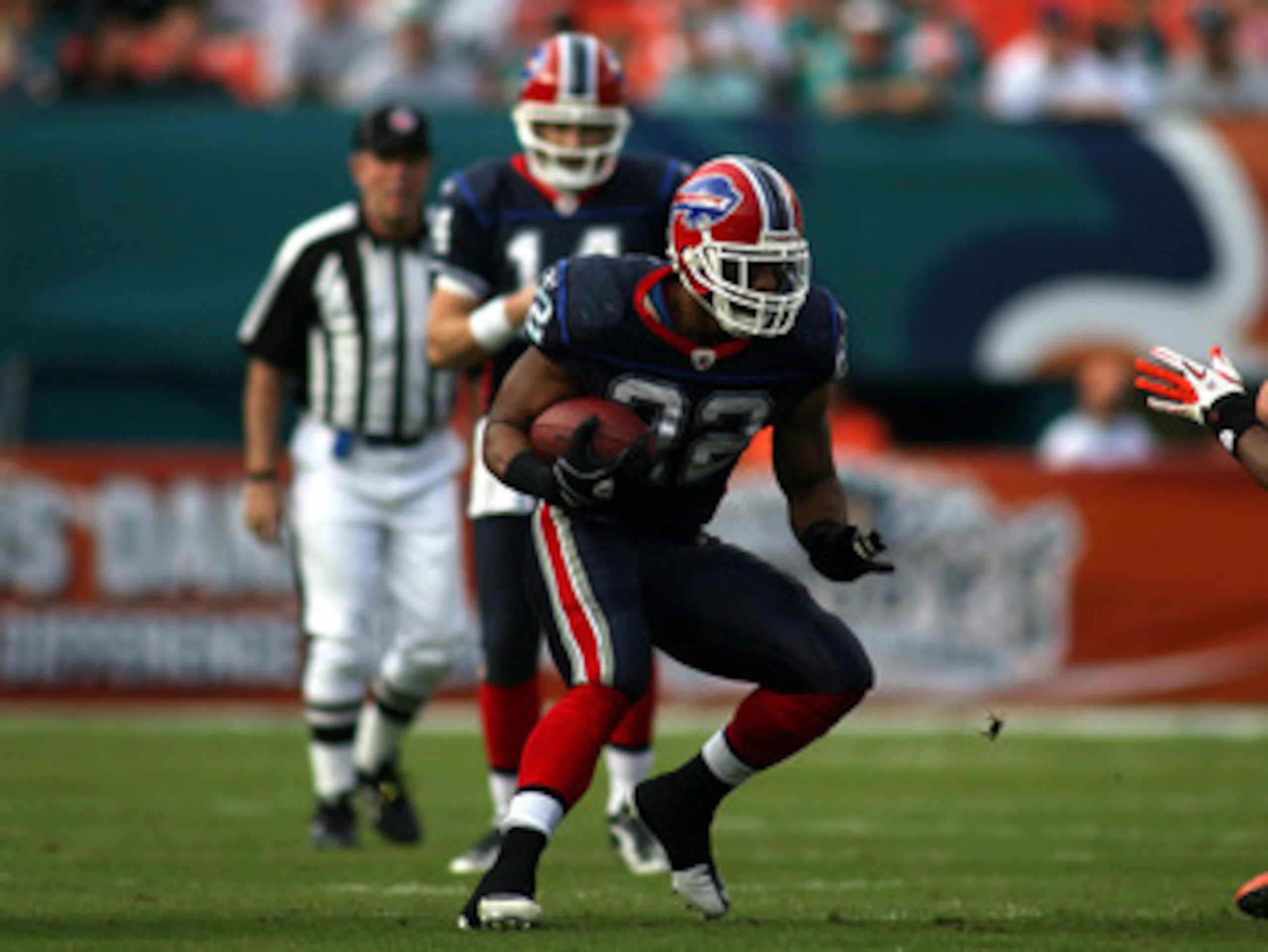 MIAMI - DECEMBER 19:  Running Back Fred Jackson #22 of the Buffalo Bills runs against the Miami Dolphins at Sun Life Stadium on December 19, 2010 in Miami, Florida.The Bills defeated the Dolphins 17-14.  (Photo by Marc Serota/Getty Images)