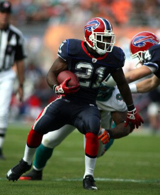 MIAMI - DECEMBER 19:  Running Back C.J. Spiller #21 of the Buffalo Bills runs against the Miami Dolphins at Sun Life Stadium on December 19, 2010 in Miami, Florida.The Bills defeated the Dolphins 17-14.  (Photo by Marc Serota/Getty Images)