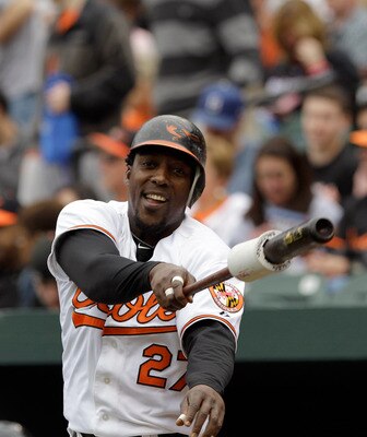 BALTIMORE, MD - APRIL 10:  Vladimir Guerrero #27 of the Baltimore Orioles in the on deck circle against the Texas Rangers at Oriole Park at Camden Yards on April 10, 2011 in Baltimore, Maryland.  (Photo by Rob Carr/Getty Images)