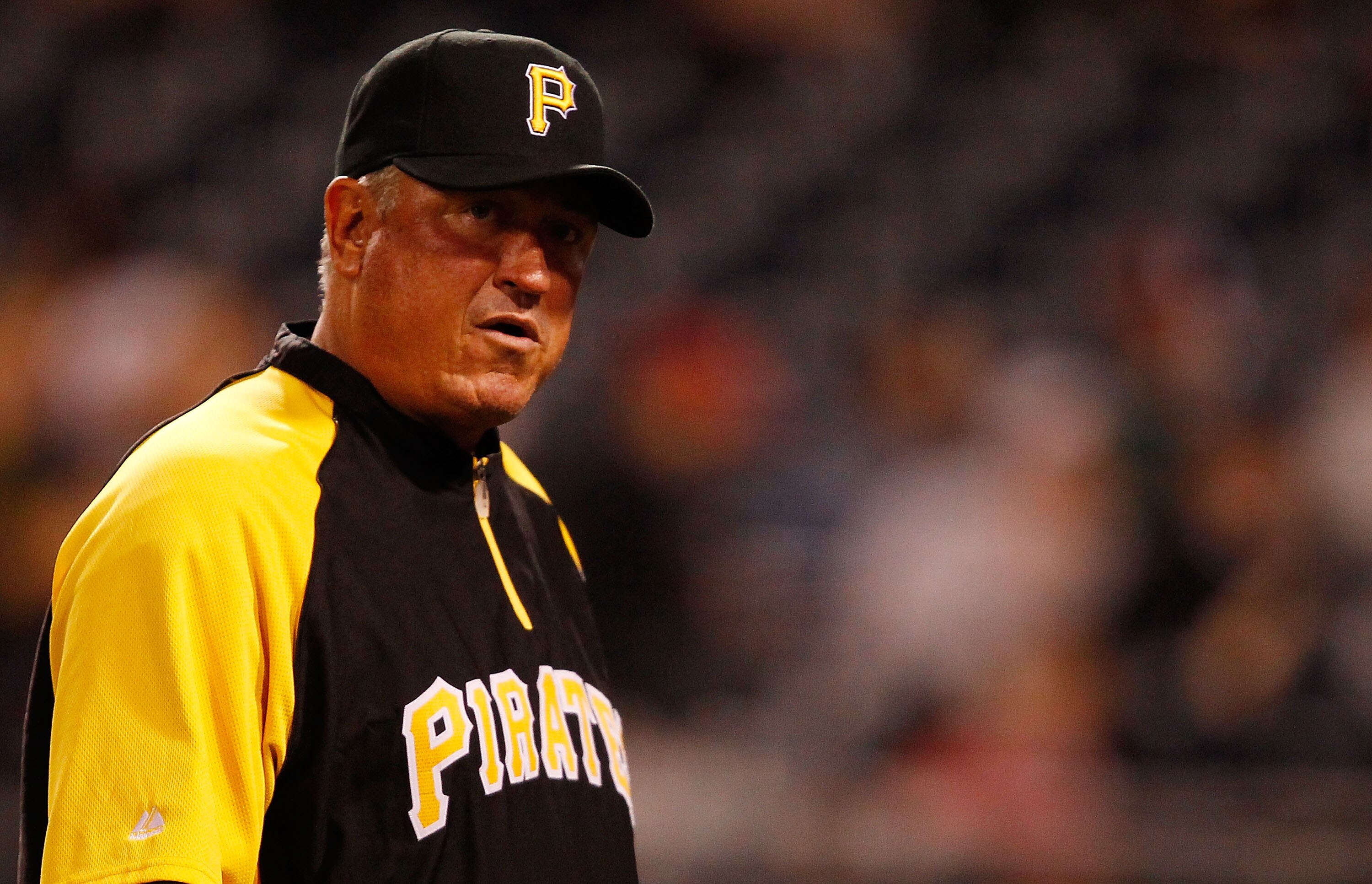 PITTSBURGH - APRIL 26:  Manager Clint Hurdle #13 of the Pittsburgh Pirates walks back to the dugout against the San Francisco Giants during the game on April 26, 2011 at PNC Park in Pittsburgh, Pennsylvania.  (Photo by Jared Wickerham/Getty Images)