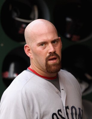 OAKLAND, CA - APRIL 19:  Kevin Youkilis #20 of the Boston Red Sox stands in the dugout before their game against the Oakland Athletics at Oakland-Alameda County Coliseum on April 19, 2011 in Oakland, California.  (Photo by Ezra Shaw/Getty Images)