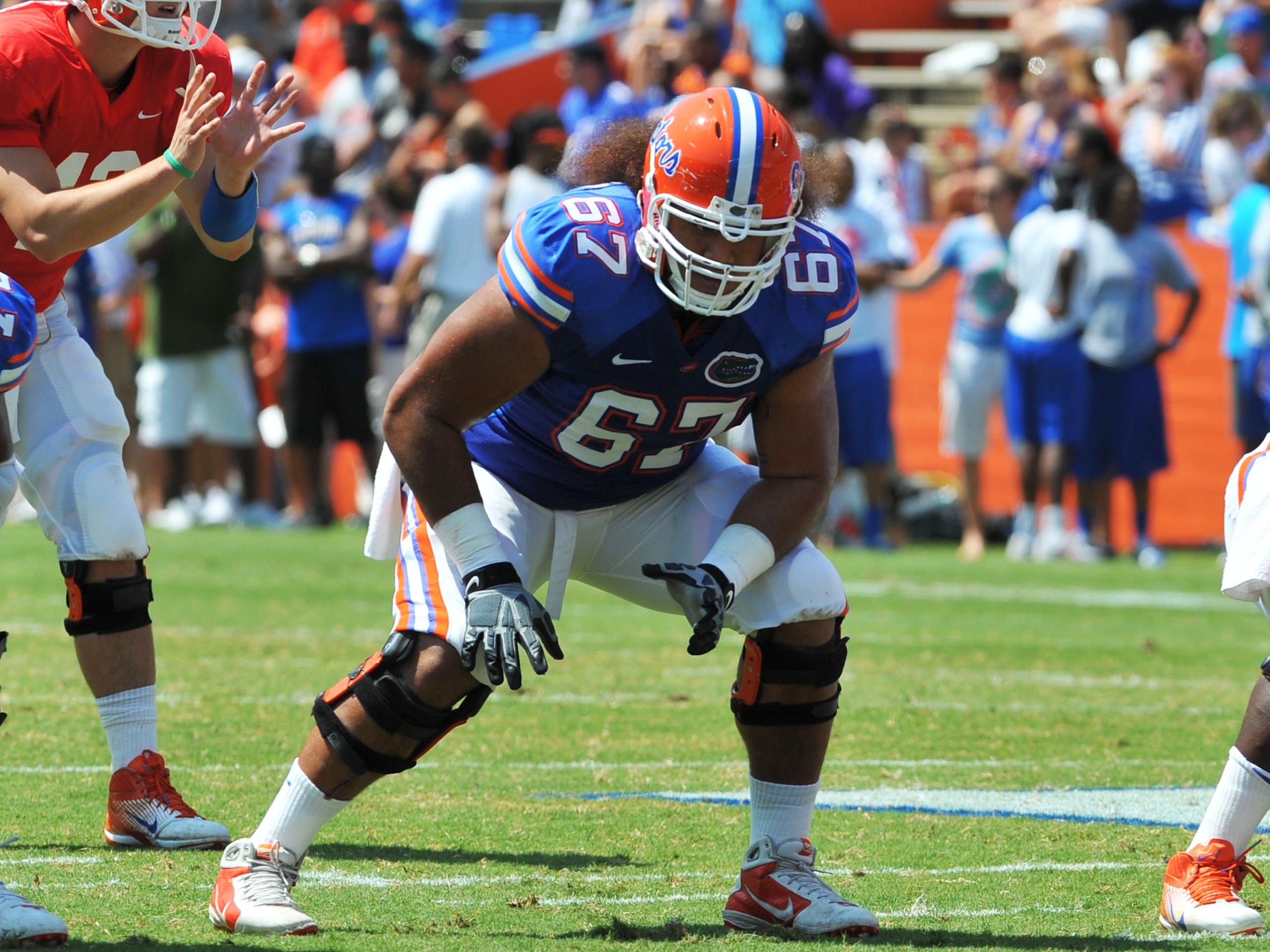 GAINESVILLE, FL - APRIL 9:  Tackle Jon Halapio #67 of the Florida Gators sets for play during the Orange and Blue spring football game April 9, 2011 at Ben Hill Griffin Stadium in Gainesville, Florida.  (Photo by Al Messerschmidt/Getty Images)