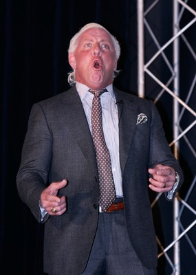 CONCORD, NC - JANUARY 20: Former American Professional Wrestler Ric Flair performs his famous yell 'Wooooo!', for the media during the NASCAR Sprint Media Tour hosted by Charlotte Motor Speedway, held at the Embassy Suites, on January 20, 2010 in Concord CONCORD, NC - JANUARY 20: Former American Professional Wrestler Ric Flair performs his famous yell 'Wooooo!', for the media during the NASCAR Sprint Media Tour hosted by Charlotte Motor Speedway, held at the Embassy Suites, on January 20, 2010 in Concord