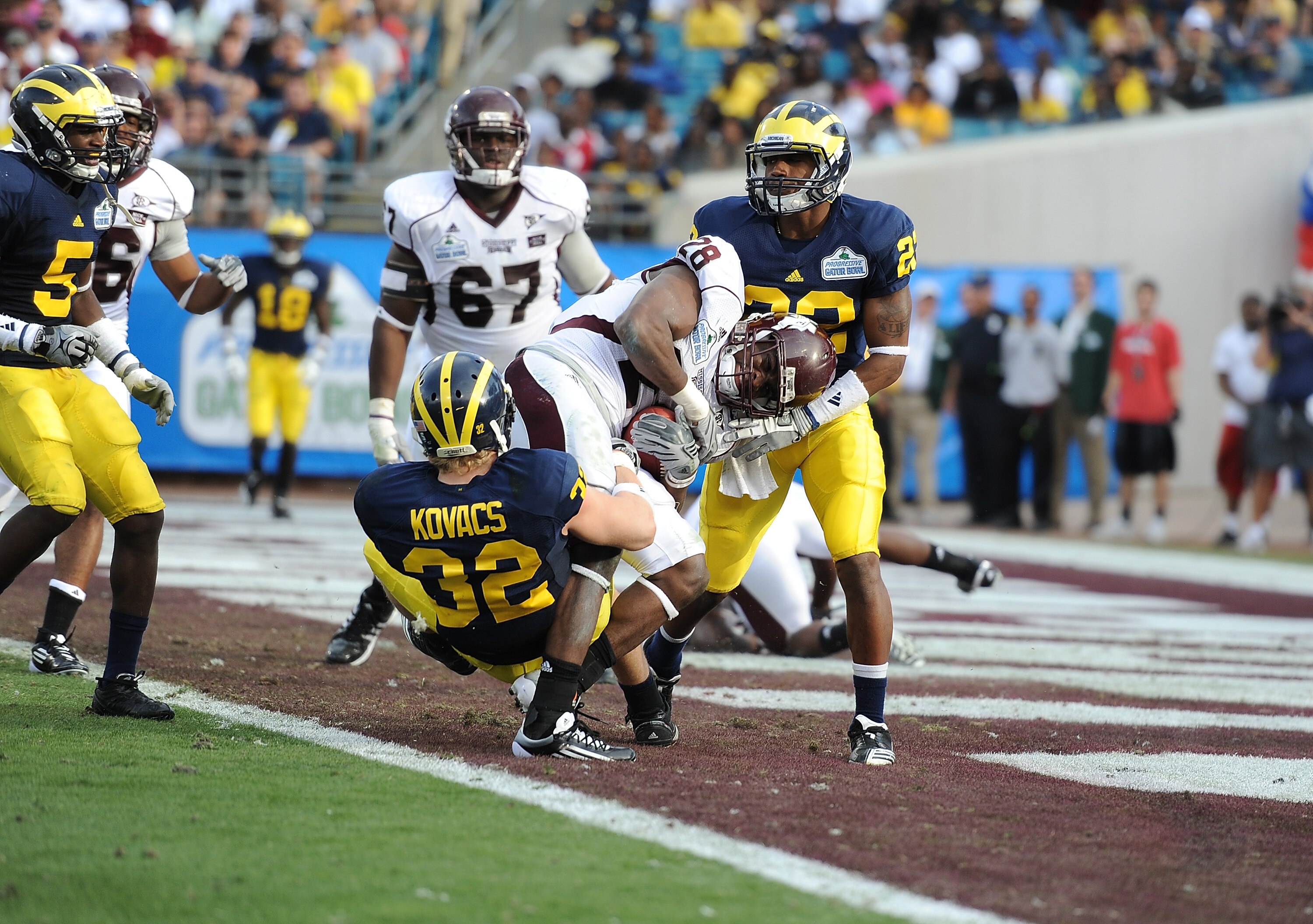JACKSONVILLE, FL - JANUARY 01:  Running back Vick Ballard #28 of the Mississippi State Bulldogs rushes for a touchdown in the 3rd quarter against the Michigan Wolverines during the Gator Bowl at EverBank Field on January 1, 2011 in Jacksonville, Florida  