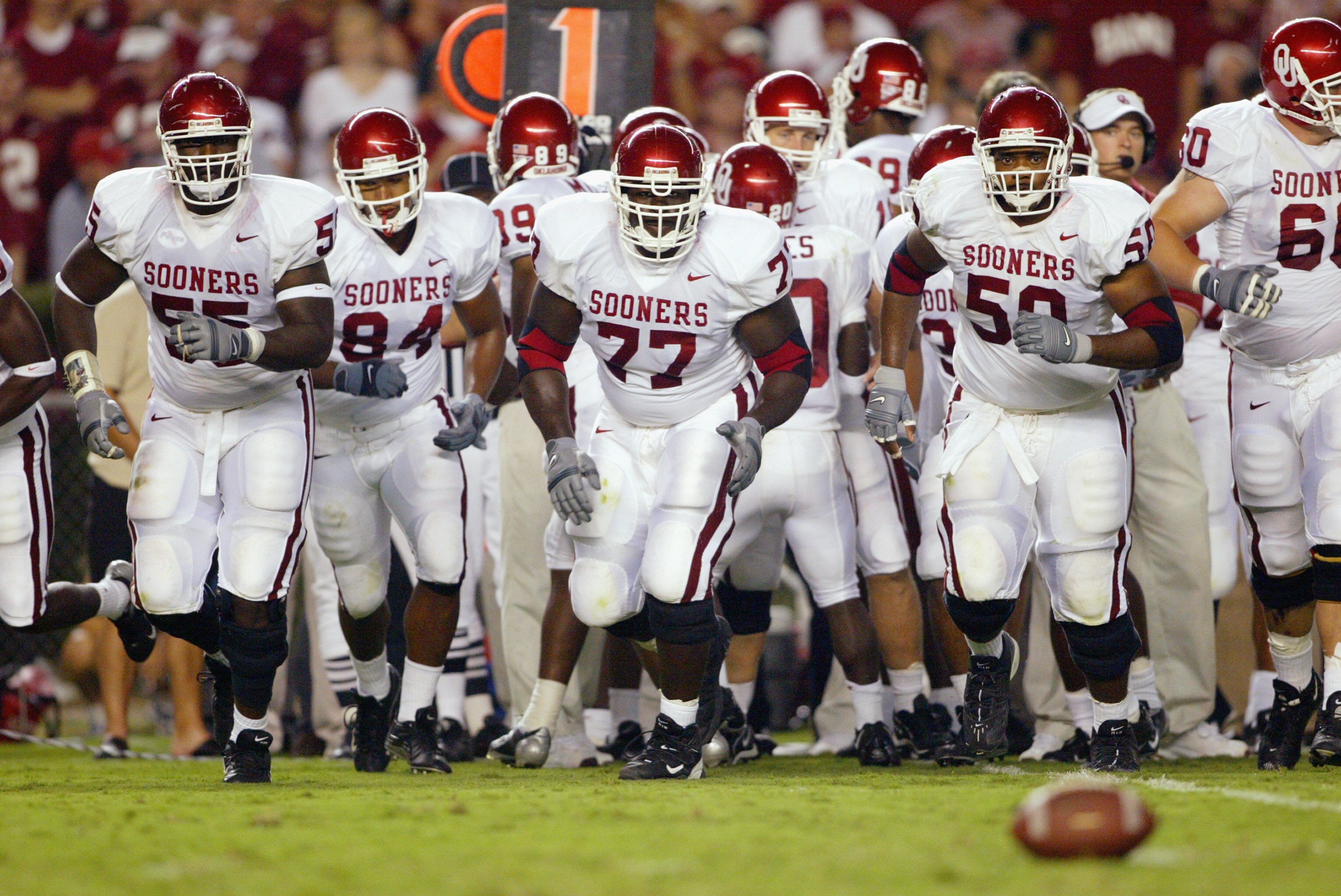 TUSCALOOSA, AL - SEPTEMBER 6: The Oklahoma Sooners offensive line emerges from a huddle against the Alabama Crimson Tide on September 6, 2003 in Tuscaloosa, Alabama. (Photo by Jamie Squire/Getty Images).