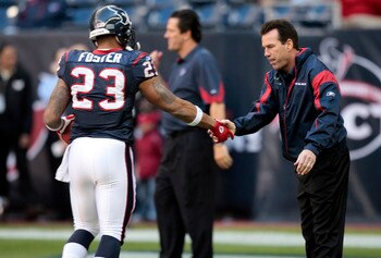 HOUSTON, TX - JANUARY 02:  Head coach Gary Kubiak of the Houston Texans greets running back Arian Foster #23 before playing the Jacksonville Jaguars at Reliant Stadium on January 2, 2011 in Houston, Texas.  (Photo by Bob Levey/Getty Images)