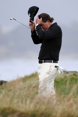 PEBBLE BEACH, CA - JUNE 20:  Phil Mickelson waits on the 17th green during the final round of the 110th U.S. Open at Pebble Beach Golf Links on June 20, 2010 in Pebble Beach, California.  (Photo by Harry How/Getty Images)