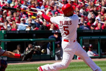 ST. LOUIS, MO - APRIL 21: Albert Pujols #5 of the St. Louis Cardinals hits a two-run home run against the Washington Nationals at Busch Stadium on April 21, 2011 in St. Louis, Missouri.  (Photo by Dilip Vishwanat/Getty Images)