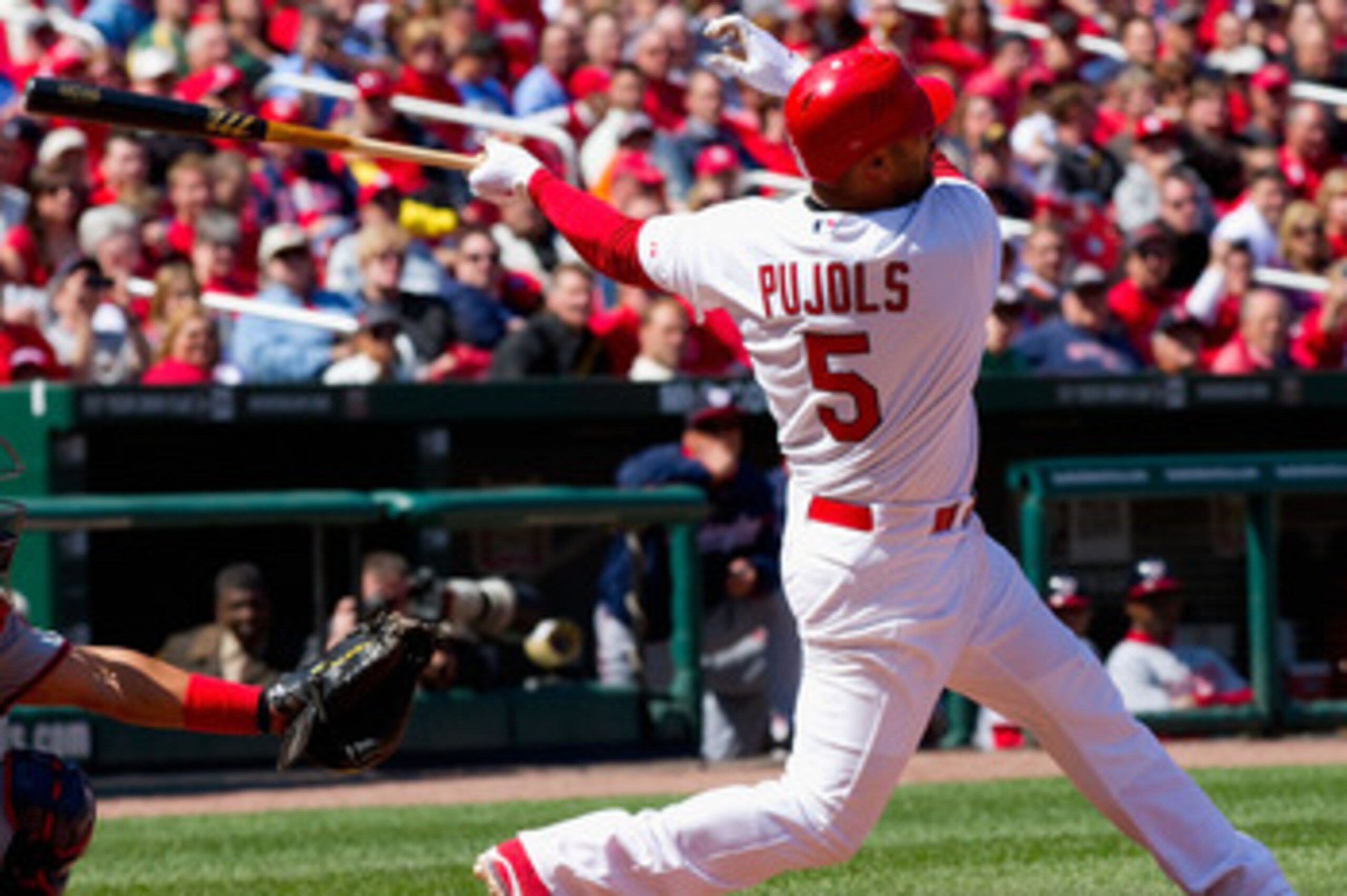 ST. LOUIS, MO - APRIL 21: Albert Pujols #5 of the St. Louis Cardinals hits a two-run home run against the Washington Nationals at Busch Stadium on April 21, 2011 in St. Louis, Missouri.  (Photo by Dilip Vishwanat/Getty Images)