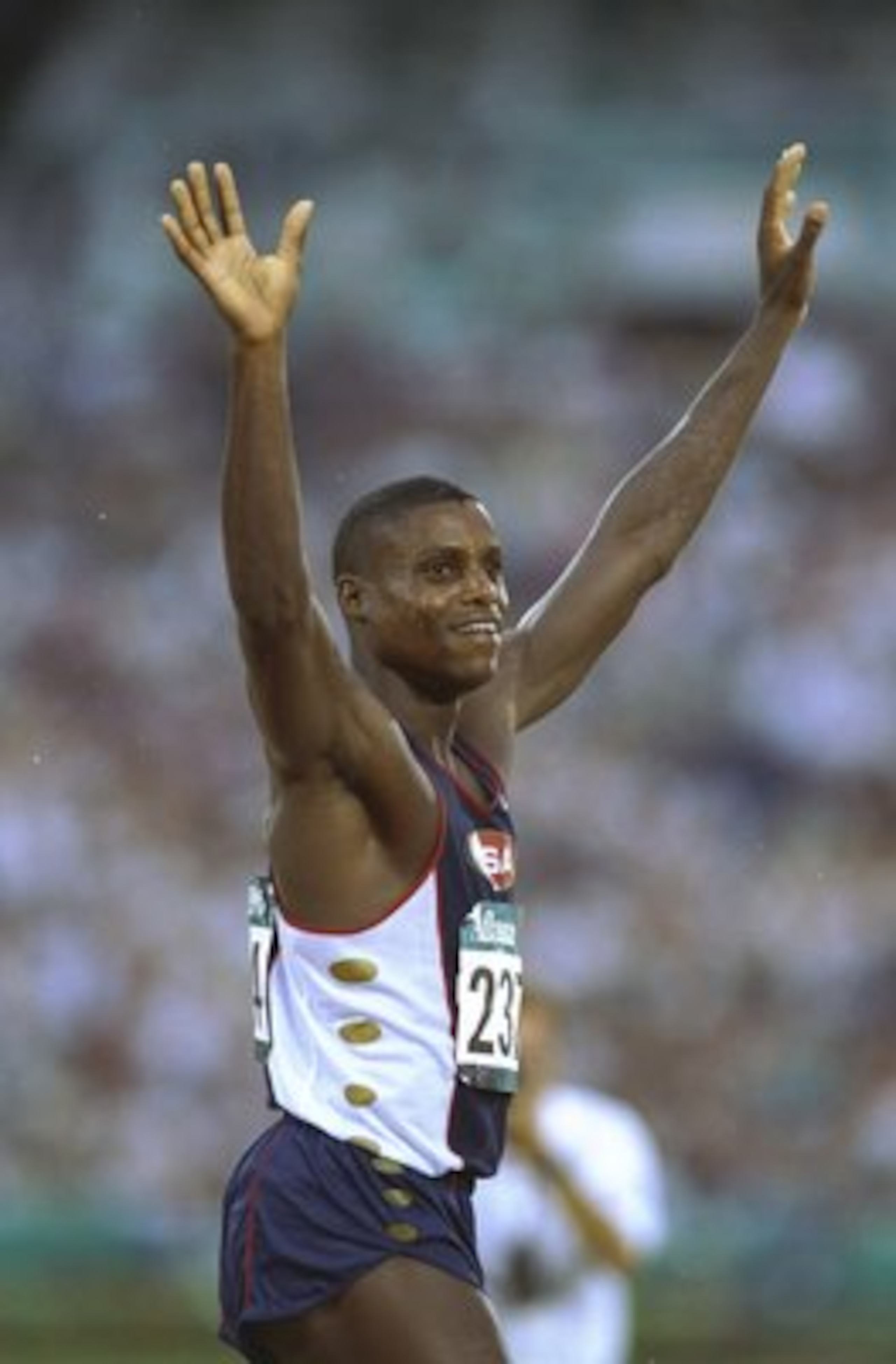 29 Jul 1996: Carl Lewis of the USA raising his arms in victory after winning the gold medal in the Long Jump event during the 1996 Olympic Games in Atlanta, Georgia. \ Mandatory Credit: Stu Forster/Allsport 29 Jul 1996: Carl Lewis of the USA raising his arms in victory after winning the gold medal in the Long Jump event during the 1996 Olympic Games in Atlanta, Georgia. \ Mandatory Credit: Stu Forster/Allsport
