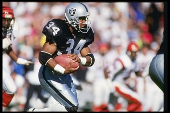 13 Jan 1991: Running back Bo Jackson of the Los Angeles Raiders runs down the field during a playoff game against the Cincinnati Bengals at the Los Angeles Coliseum in Los Angeles, California. The Raiders won the game 20-10.