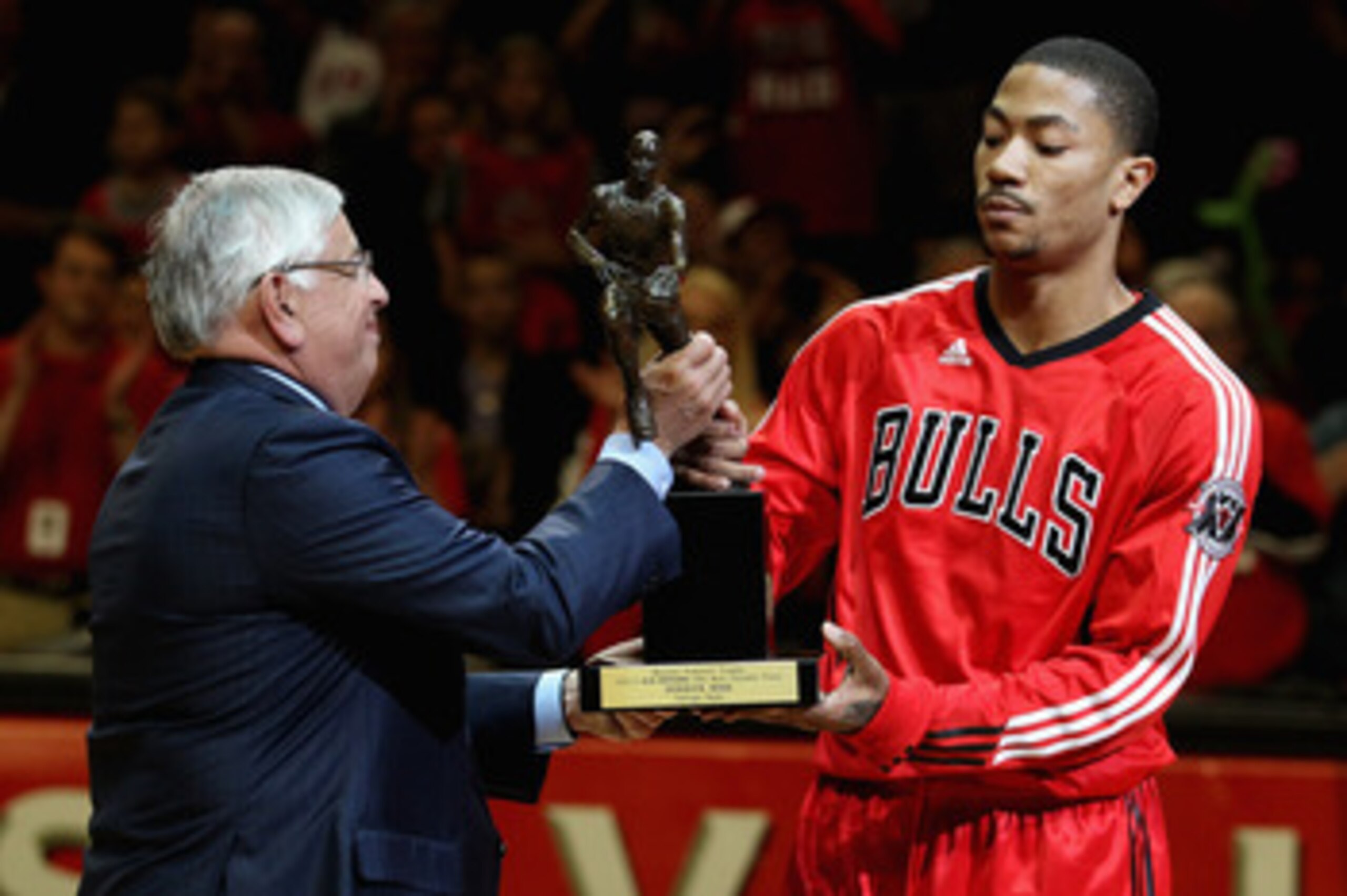 CHICAGO, IL - MAY 04: Derrick Rose #1 of the Chicago Bulls accepts the Maurice Podoloff Trophy awarded to the NBA Most Valuable Player from Commissoner David Stern before taking on the Atlanta Hawks in Game Two of the Eastern Conference Semifinals in the 