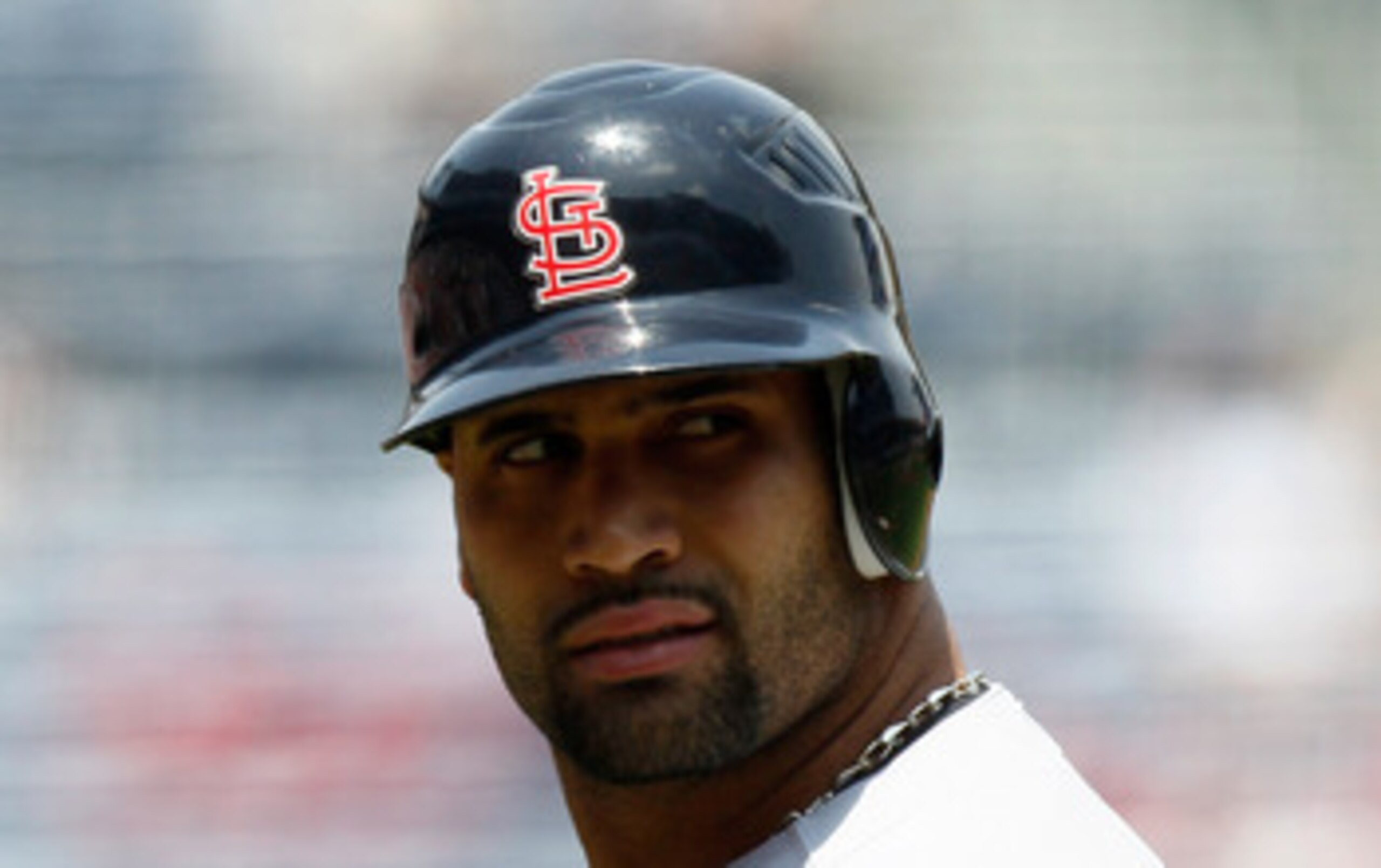 ATLANTA, GA - MAY 01:  Albert Pujols #5 of the St. Louis Cardinals looks back at the homeplate umpire after striking out against the Atlanta Braves at Turner Field on May 1, 2011 in Atlanta, Georgia.  (Photo by Kevin C. Cox/Getty Images)