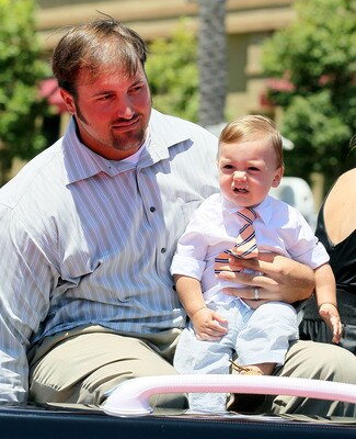 ANAHEIM, CA - JULY 13:  National League All-Star Jonathan Broxton #51 of the Los Angeles Dodgers smiles for fans during the 6th Annual MLB All-Star Red Carpet Show outside Angel Stadium of Anaheim on July 13, 2010 in Anaheim, California.  (Photo by Stephe