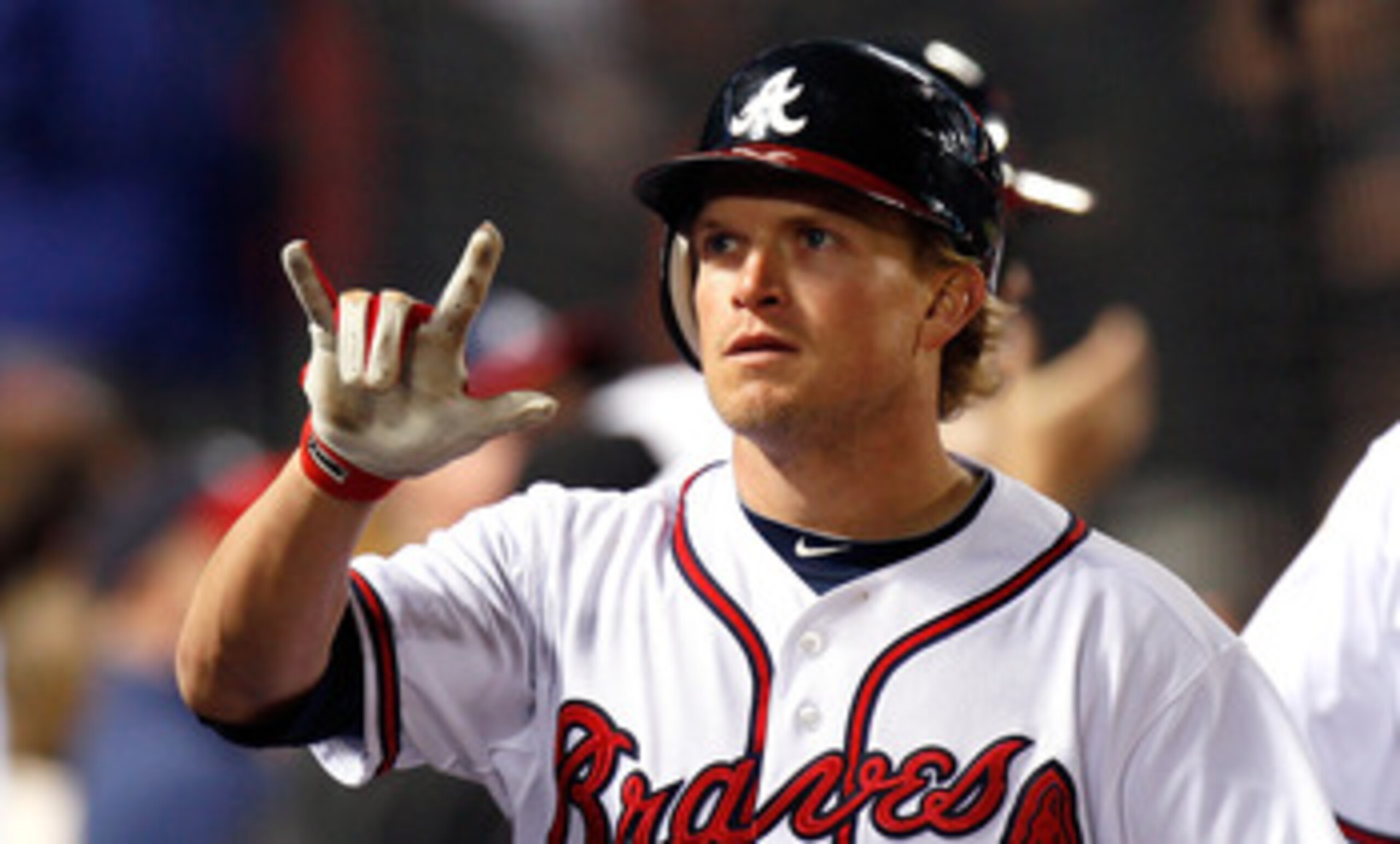 ATLANTA, GA - MAY 04:  Nate McLouth #13 of the Atlanta Braves reacts after hitting a two-run homer in the fourth inning against the Milwaukee Brewers at Turner Field on May 4, 2011 in Atlanta, Georgia.  (Photo by Kevin C. Cox/Getty Images)