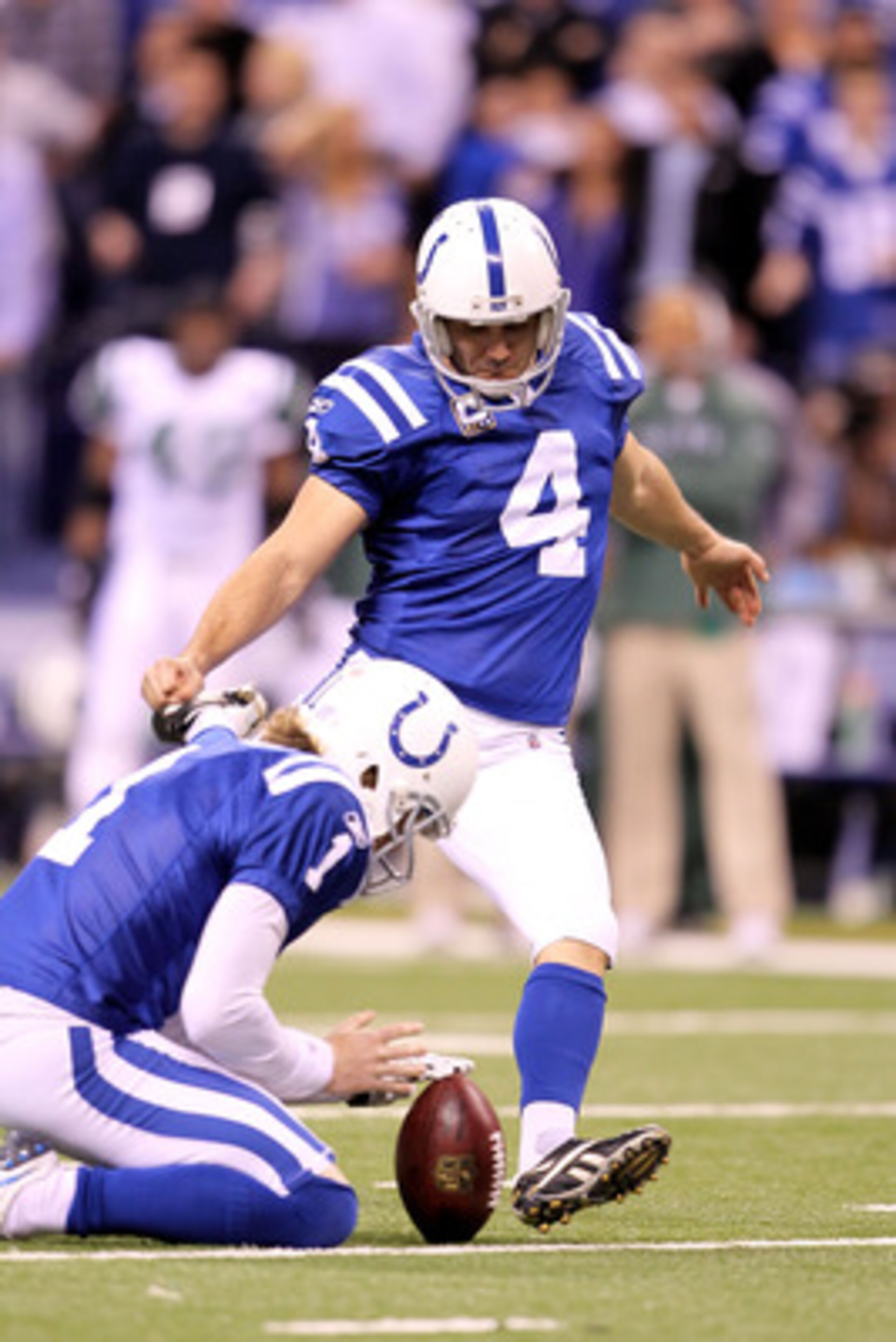 INDIANAPOLIS, IN - JANUARY 08:  Adam Vinatieri #4 of the Indianapolis Colts kicks a successful 50-yard field goal in the fourth quarter against the New York Jets during their 2011 AFC wild card playoff game at Lucas Oil Stadium on January 8, 2011 in India
