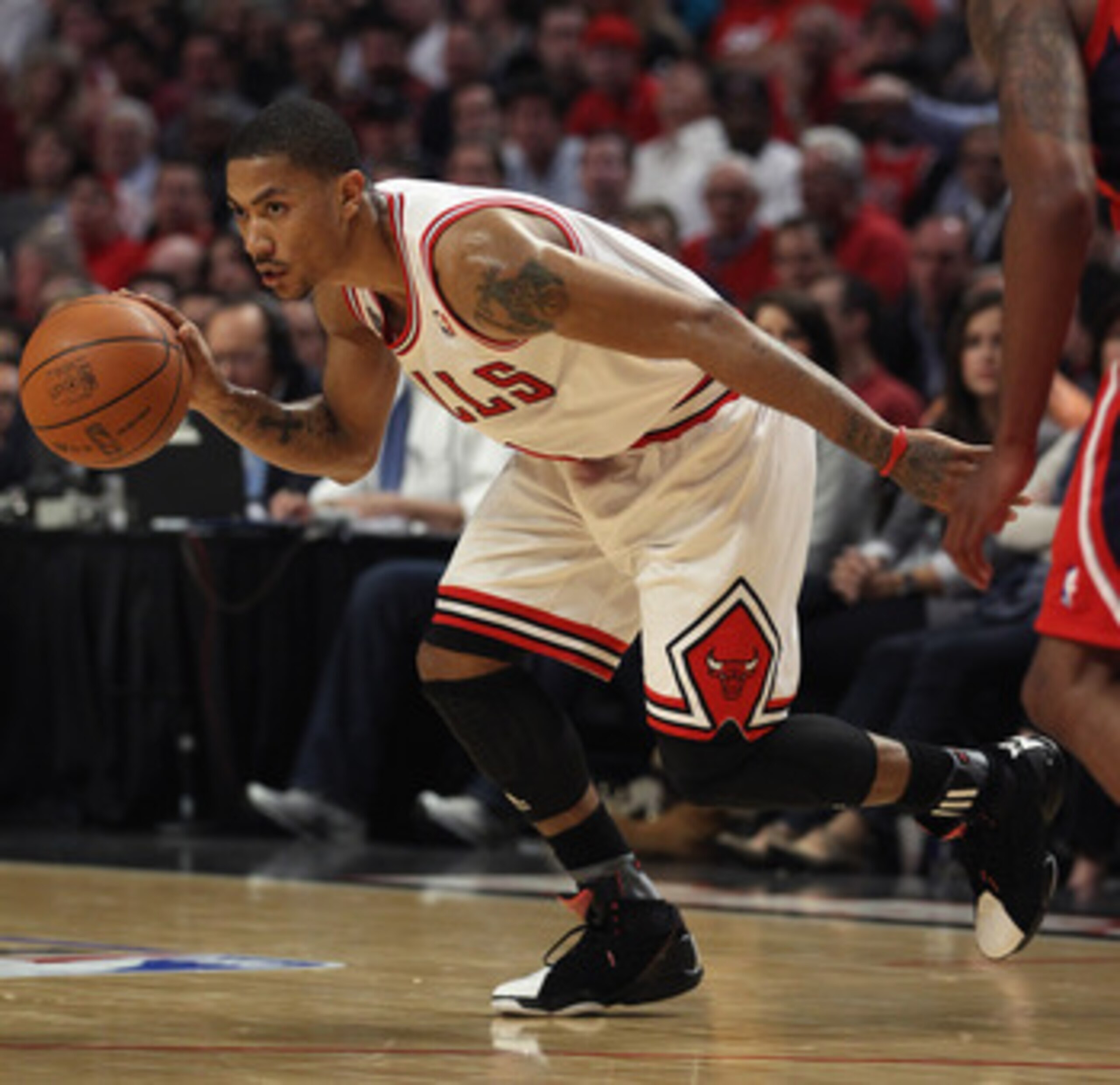 CHICAGO, IL - MAY 02: Derrick Rose #1 of the Chicago Bulls moves the Atlanta Hawks in Game One of the Eastern Conference Semifinals in the 2011 NBA Playoffs at the United Center on May 2, 2011 in Chicago, Illinois. The Hawks defeated the Bulls 103-95. NOT