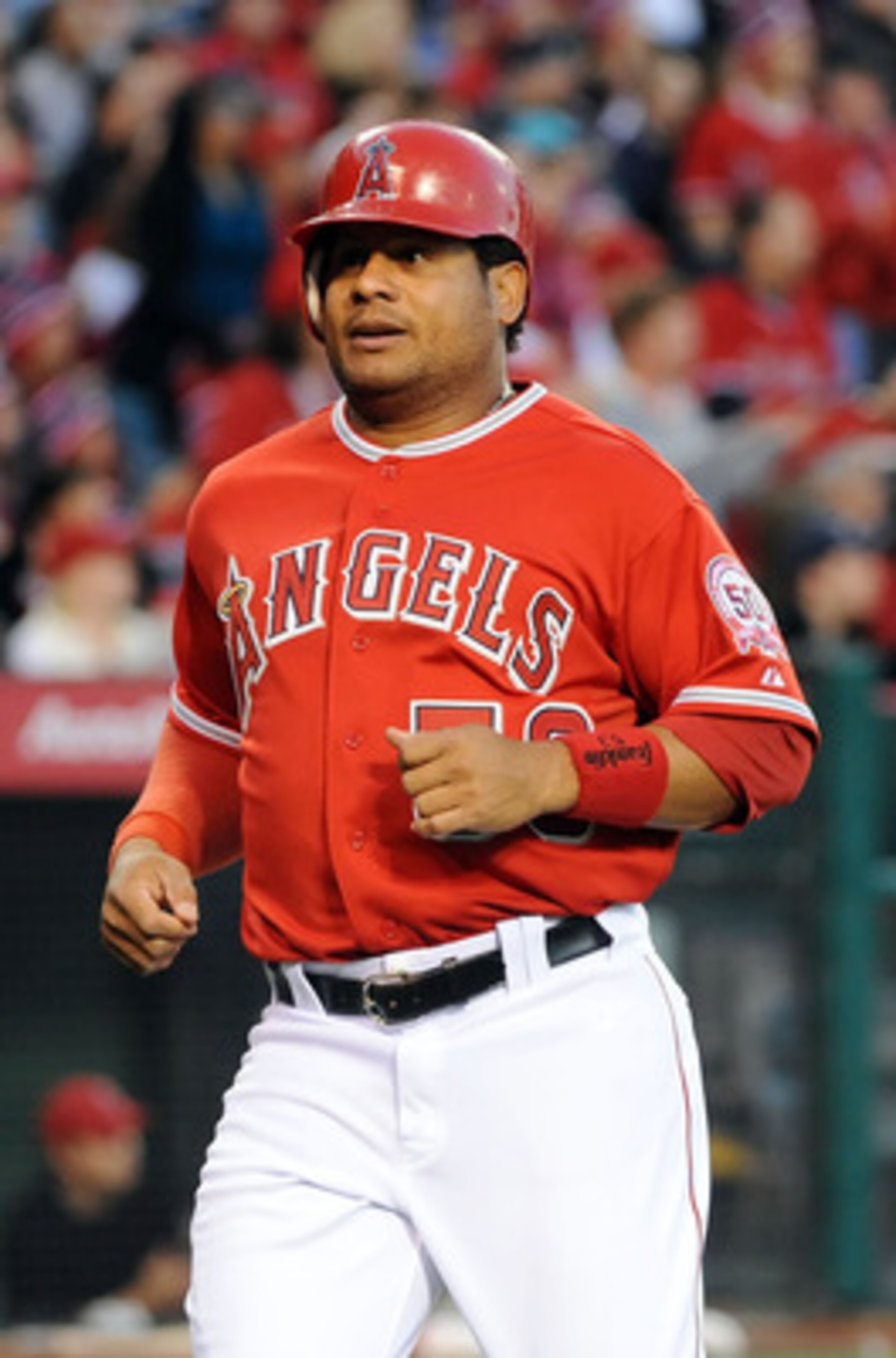 ANAHEIM, CA - APRIL 09:  Bobby Abreu #53 of Los Angeles Angels of Anaheim runs home to score in the third inning against the Toronto Blue Jays at Angel Stadium of Anaheim on April 9, 2011 in Anaheim, California.  (Photo by Lisa Blumenfeld/Getty Images)