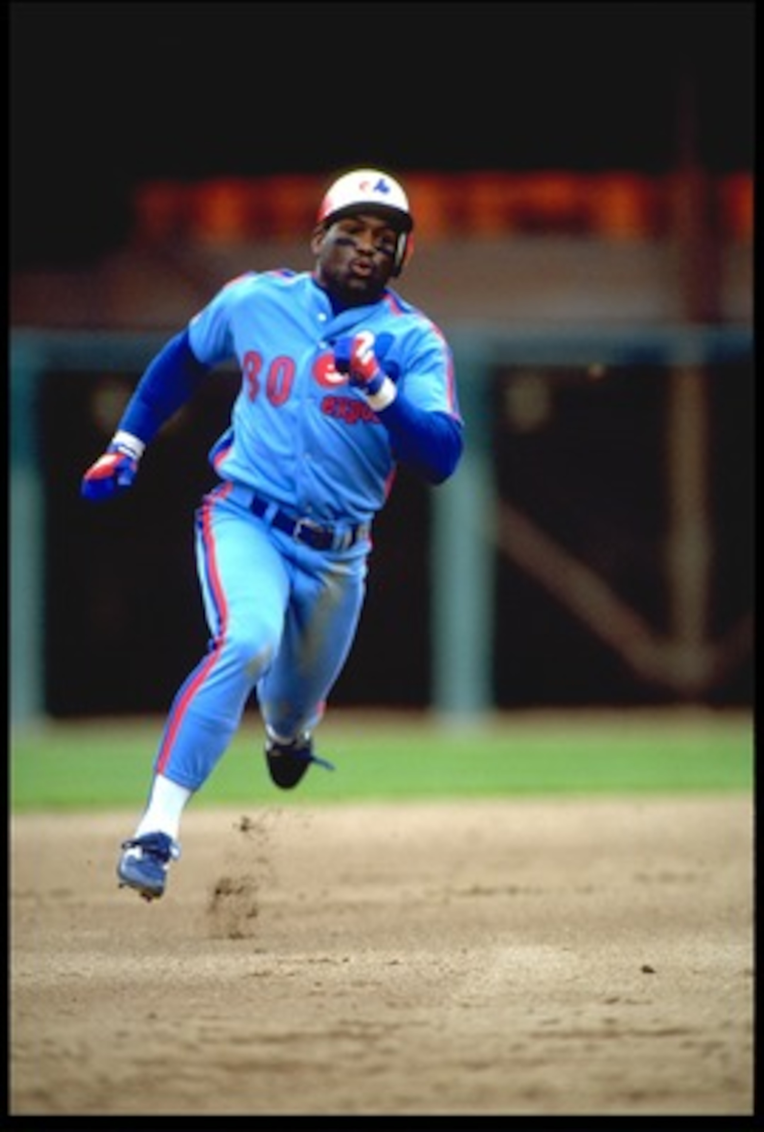 1990: MONTREAL EXPOS OUTFIELDER TIM RAINES ROUNDS SECOND BASE DURING THE EXPOS VERSUS SAN FRANCISCO GIANTS GAME AT CANDLESTICK PARK IN SAN FRANCISCO, CALIFORNIA. 1990: MONTREAL EXPOS OUTFIELDER TIM RAINES ROUNDS SECOND BASE DURING THE EXPOS VERSUS SAN FRANCISCO GIANTS GAME AT CANDLESTICK PARK IN SAN FRANCISCO, CALIFORNIA.