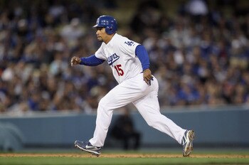LOS ANGELES, CA - APRIL 03:  Rafael Furcal #15 of the Los Angeles Dodgers leads off of second base against the San Francisco Giants at Dodger Stadium on April 3, 2011 in Los Angeles, California.  (Photo by Jeff Gross/Getty Images)