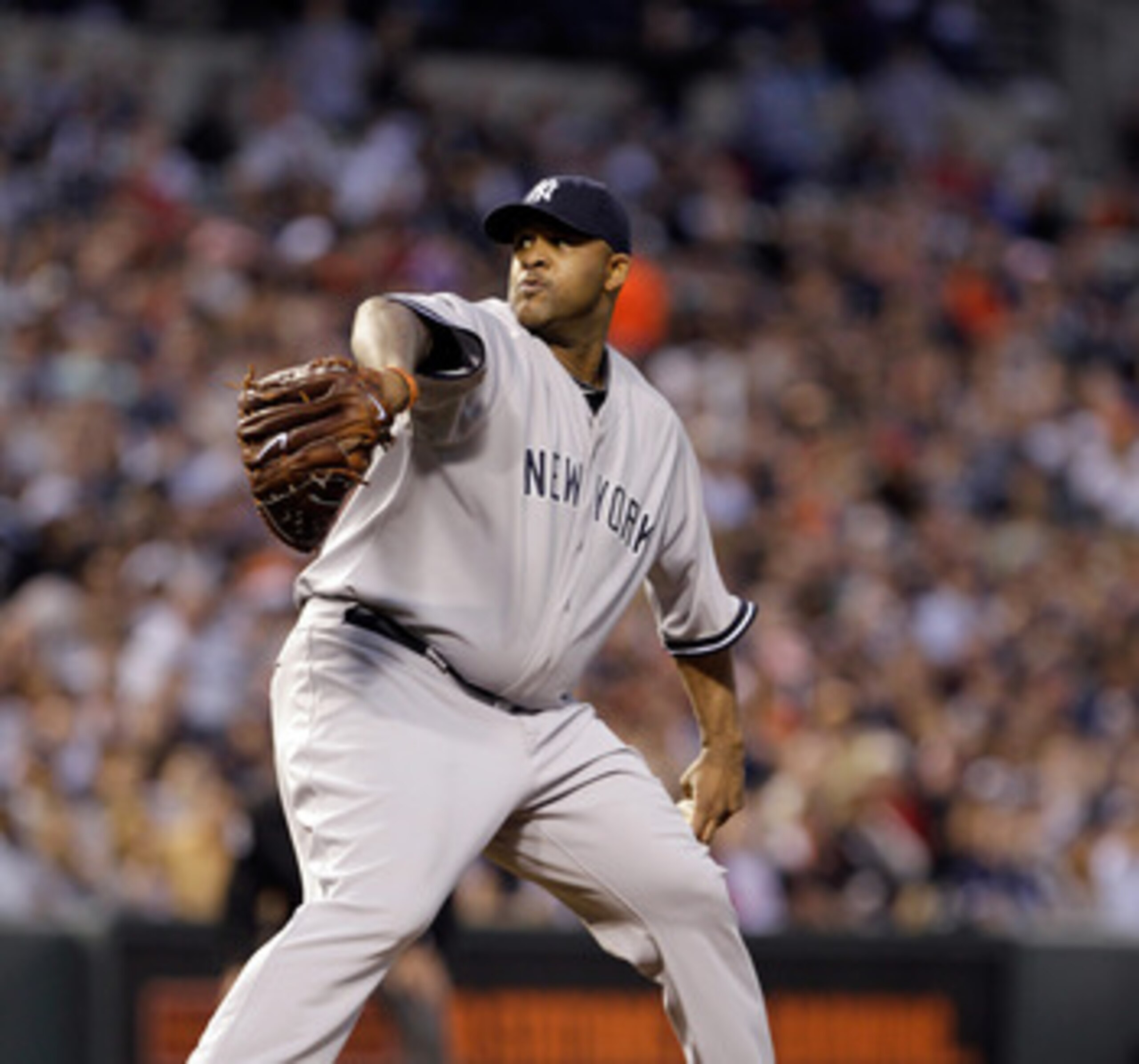 BALTIMORE, MD - APRIL 23:  Pitcher CC Sabathia #52 of the New York Yankees delivers to a Baltimore Orioles batter at Oriole Park at Camden Yards on April 23, 2011 in Baltimore, Maryland.  (Photo by Rob Carr/Getty Images)