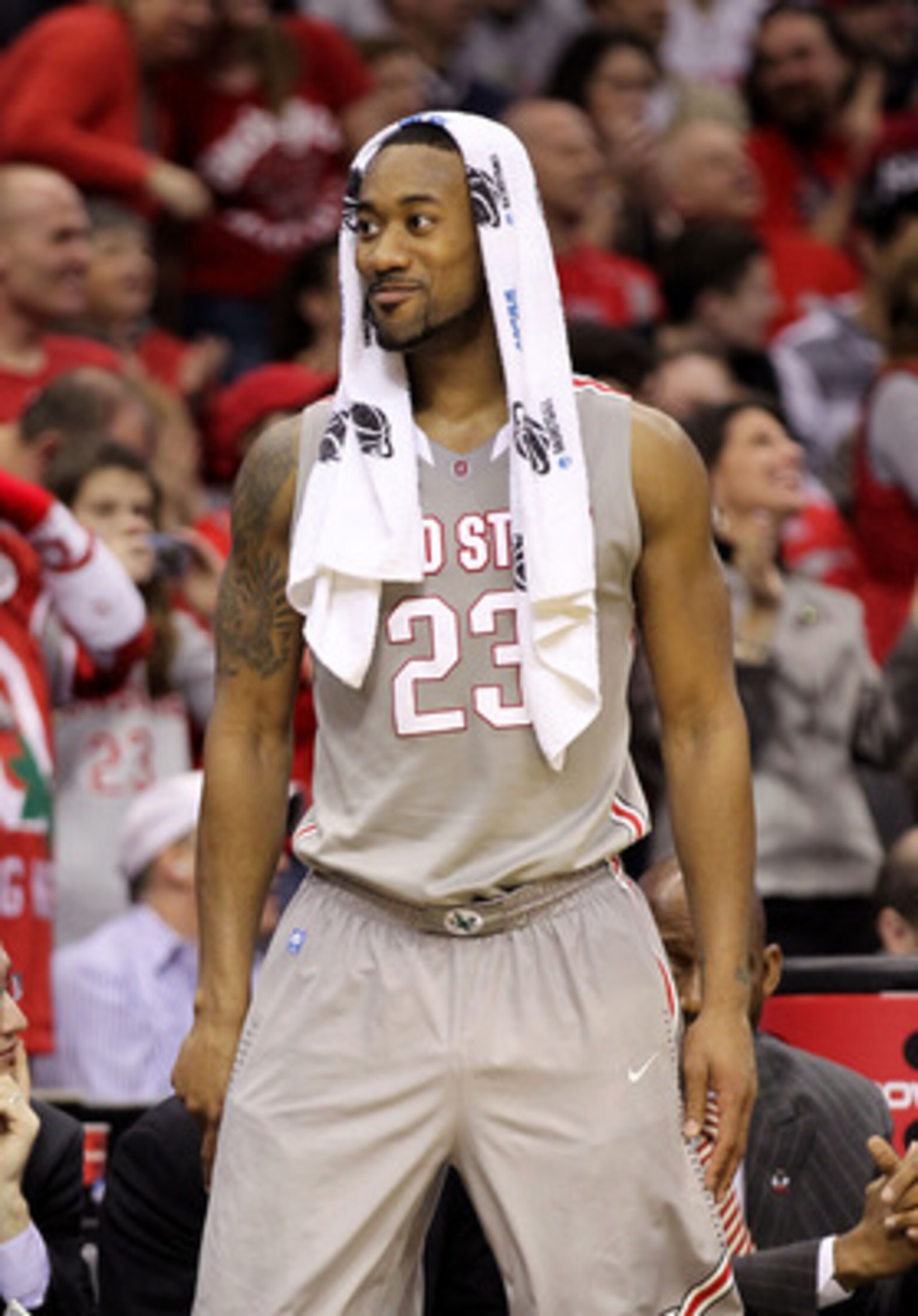 CLEVELAND, OH - MARCH 20: David Lighty #23 of the Ohio State Buckeyes looks on from the bench during the second half against the George Mason Patriots during the third of the 2011 NCAA men's basketball tournament at Quicken Loans Arena on March 20, 2011 i