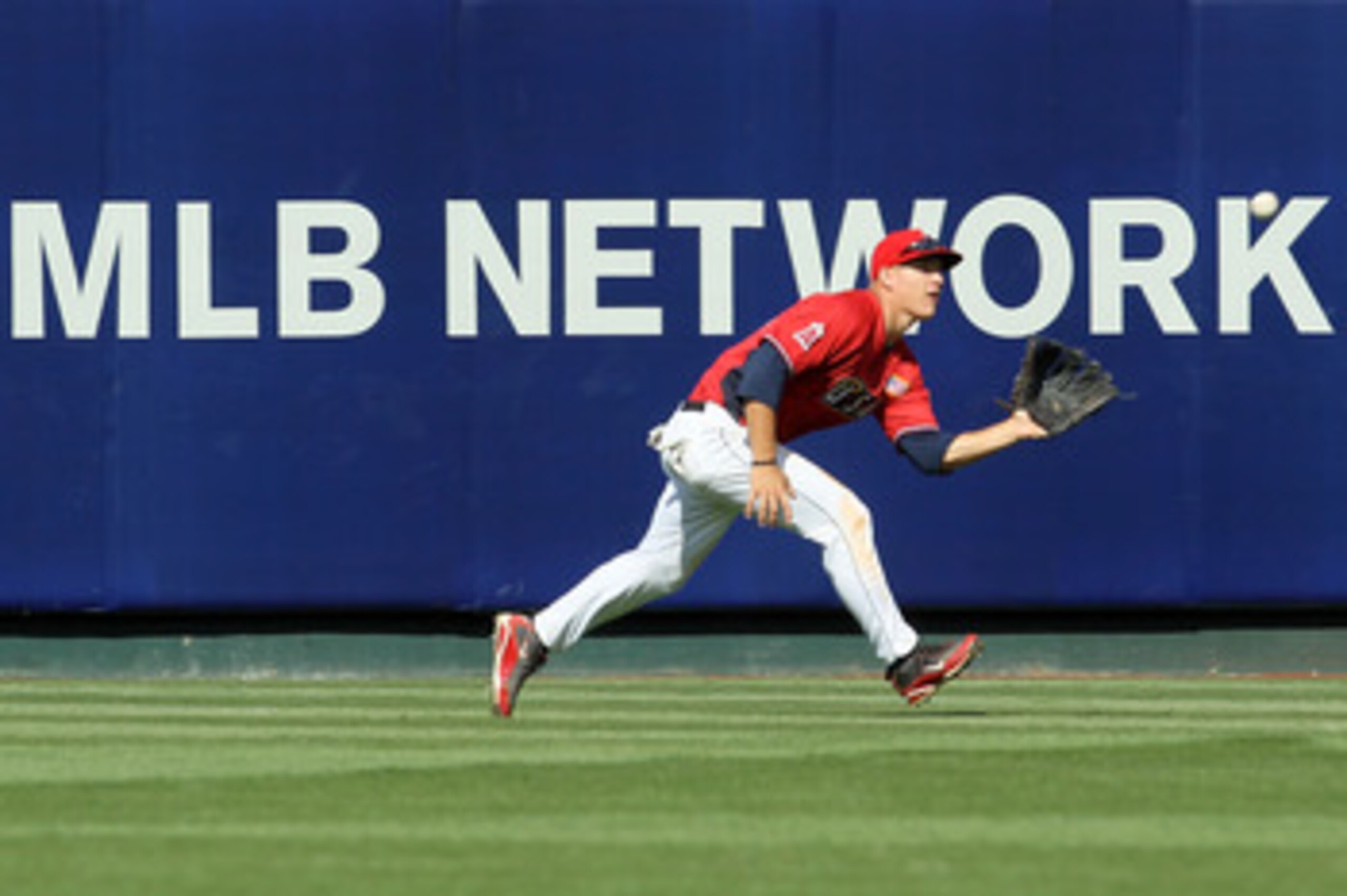 ANAHEIM, CA - JULY 11:  U.S. Futures All-Star Brett Jackson #13 of the Chicago Cubs makes the catch on a fly ball during the 2010 XM All-Star Futures Game at Angel Stadium of Anaheim on July 11, 2010 in Anaheim, California.  (Photo by Stephen Dunn/Getty I