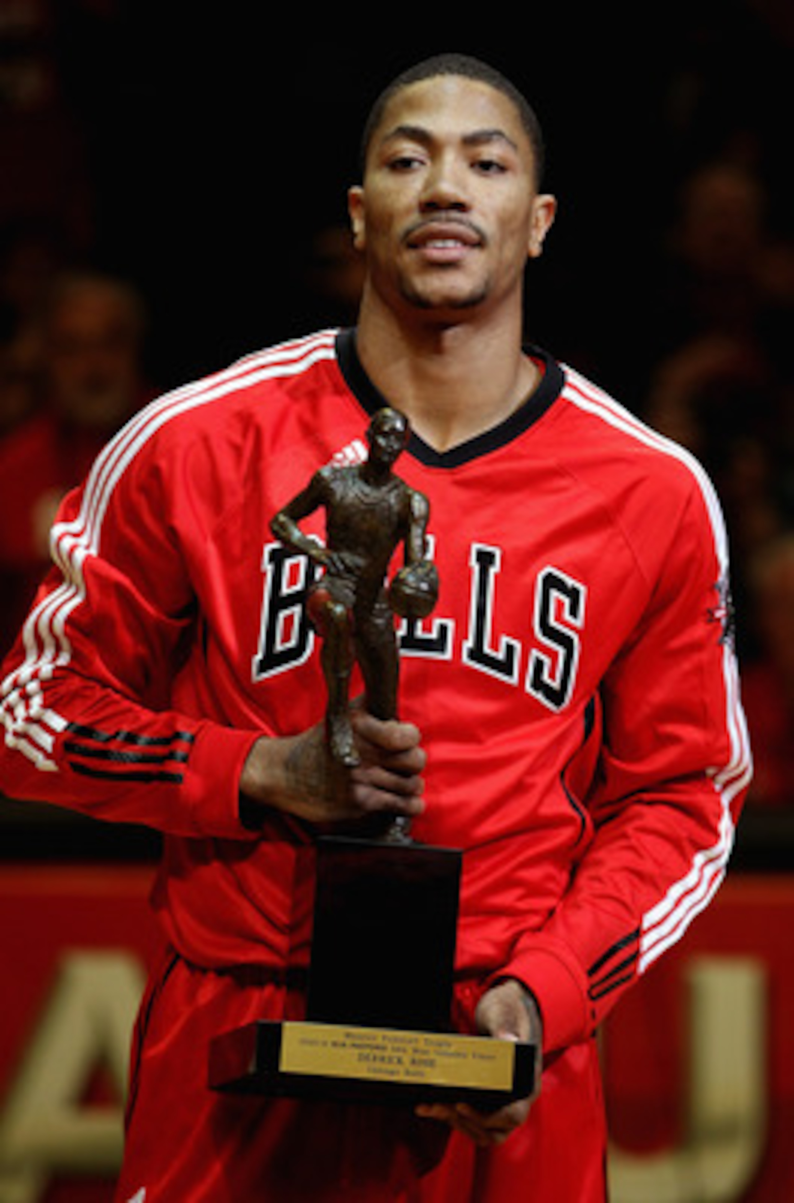 CHICAGO, IL - MAY 04: Derrick Rose #1 of the Chicago Bulls holds the Maurice Podoloff Trophy awarded to the NBA Most Valuable Player before taking on the Atlanta Hawks in Game Two of the Eastern Conference Semifinals in the 2011 NBA Playoffs at the United