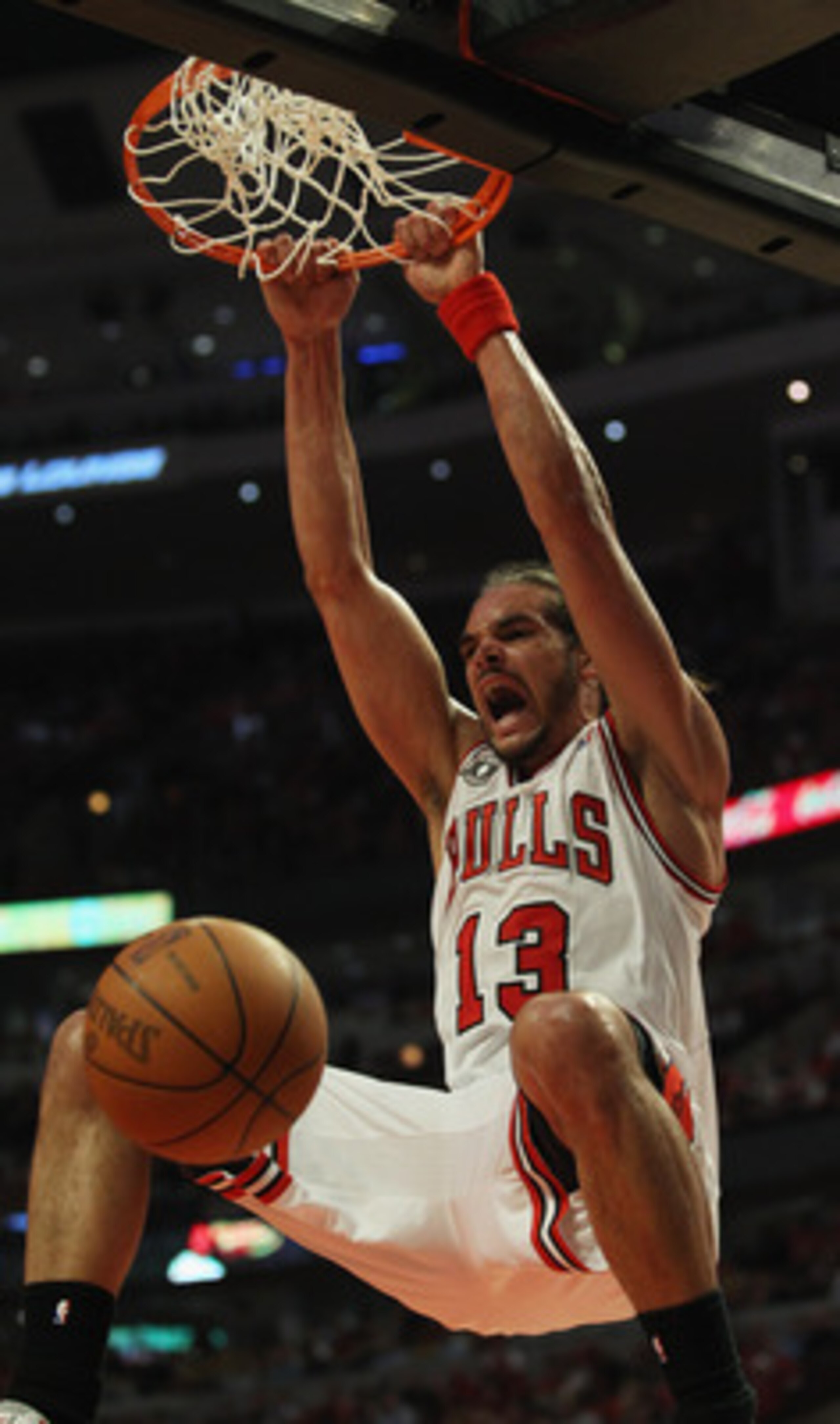 CHICAGO, IL - MAY 02: Joakim Noah #13 of the Chicago Bulls dunks the ball against the Atlanta Hawks in Game One of the Eastern Conference Semifinals in the 2011 NBA Playoffs at the United Center on May 2, 2011 in Chicago, Illinois. The Hawks defeated the 