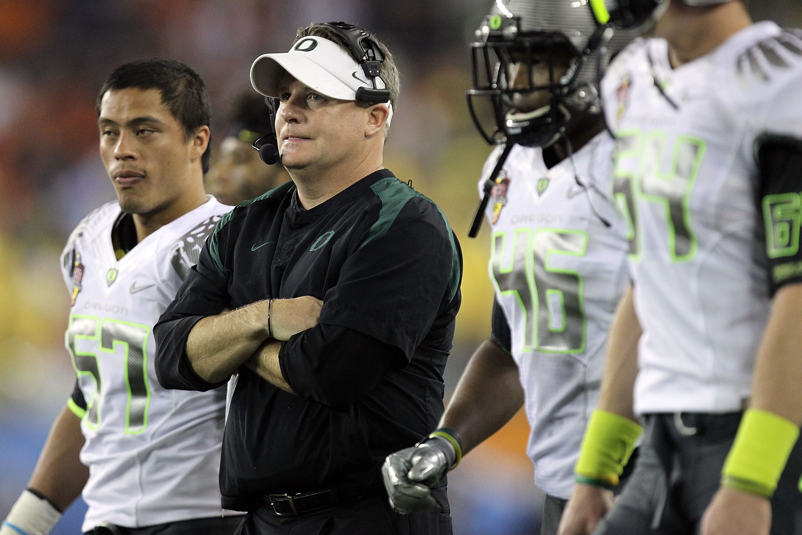 GLENDALE, AZ - JANUARY 10: Head coach Chip Kelly of the Oregon Ducks looks on against the Auburn Tigers in the Tostitos BCS National Championship Game at University of Phoenix Stadium on January 10, 2011 in Glendale, Arizona. (Photo by Ronald Martinez/G GLENDALE, AZ - JANUARY 10: Head coach Chip Kelly of the Oregon Ducks looks on against the Auburn Tigers in the Tostitos BCS National Championship Game at University of Phoenix Stadium on January 10, 2011 in Glendale, Arizona. (Photo by Ronald Martinez/G