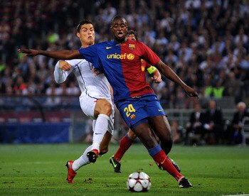 ROME - MAY 27:  Cristiano Ronaldo of Manchester United battles for the ball with Yaya Toure of Barcelona during the Champions League Final match between Barcelona and Manchester United at the Stadio Olimpico on May 27, 2009 in Rome, Italy. Barcelona won 2