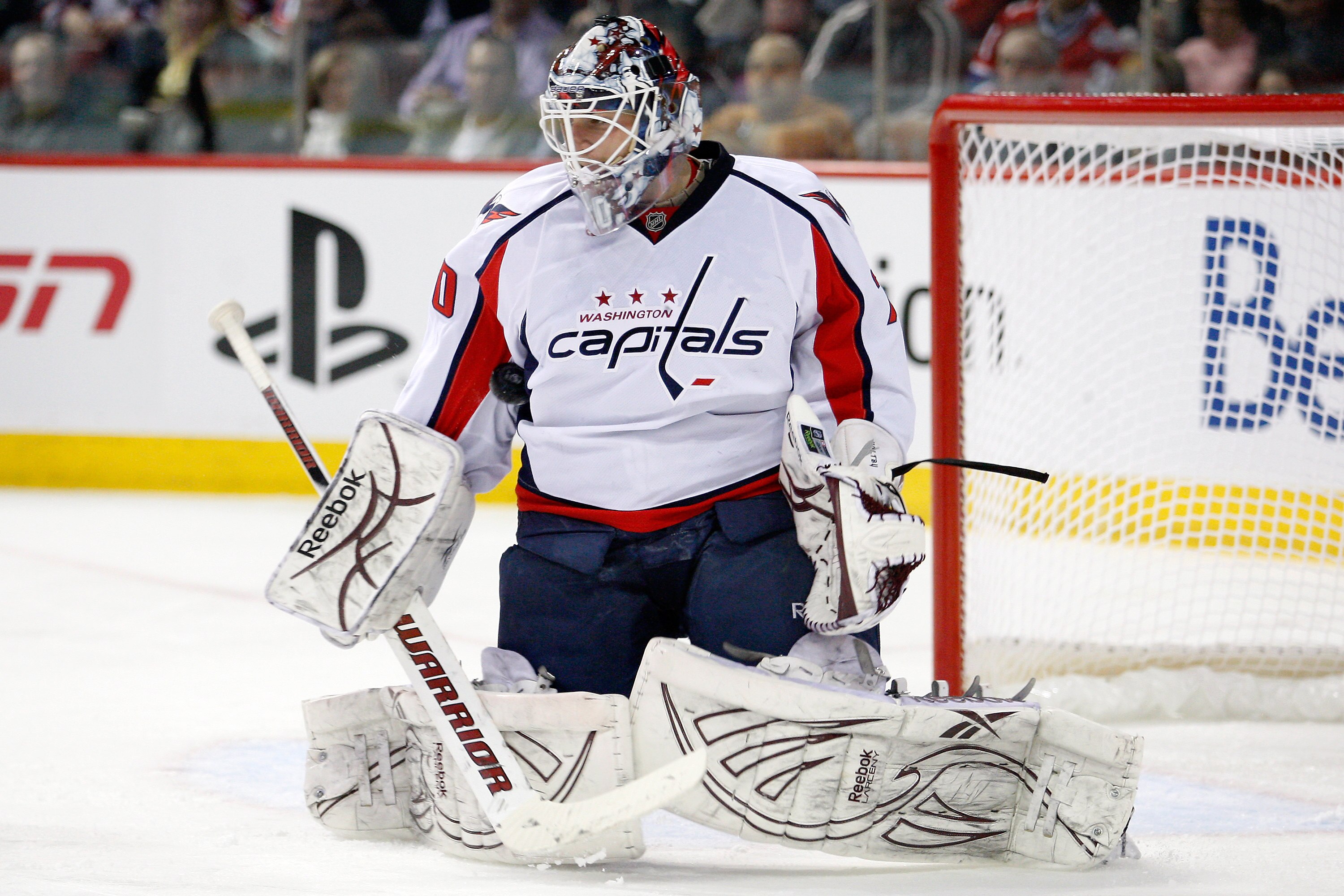 MONTREAL, CANADA - MARCH 15:  Braden Holtby #70 of the Washington Capitals stops the puck during the NHL game aagainst the Montreal Canadiens t the Bell Centre on March 15, 2011 in Montreal, Quebec, Canada.  (Photo by Richard Wolowicz/Getty Images)