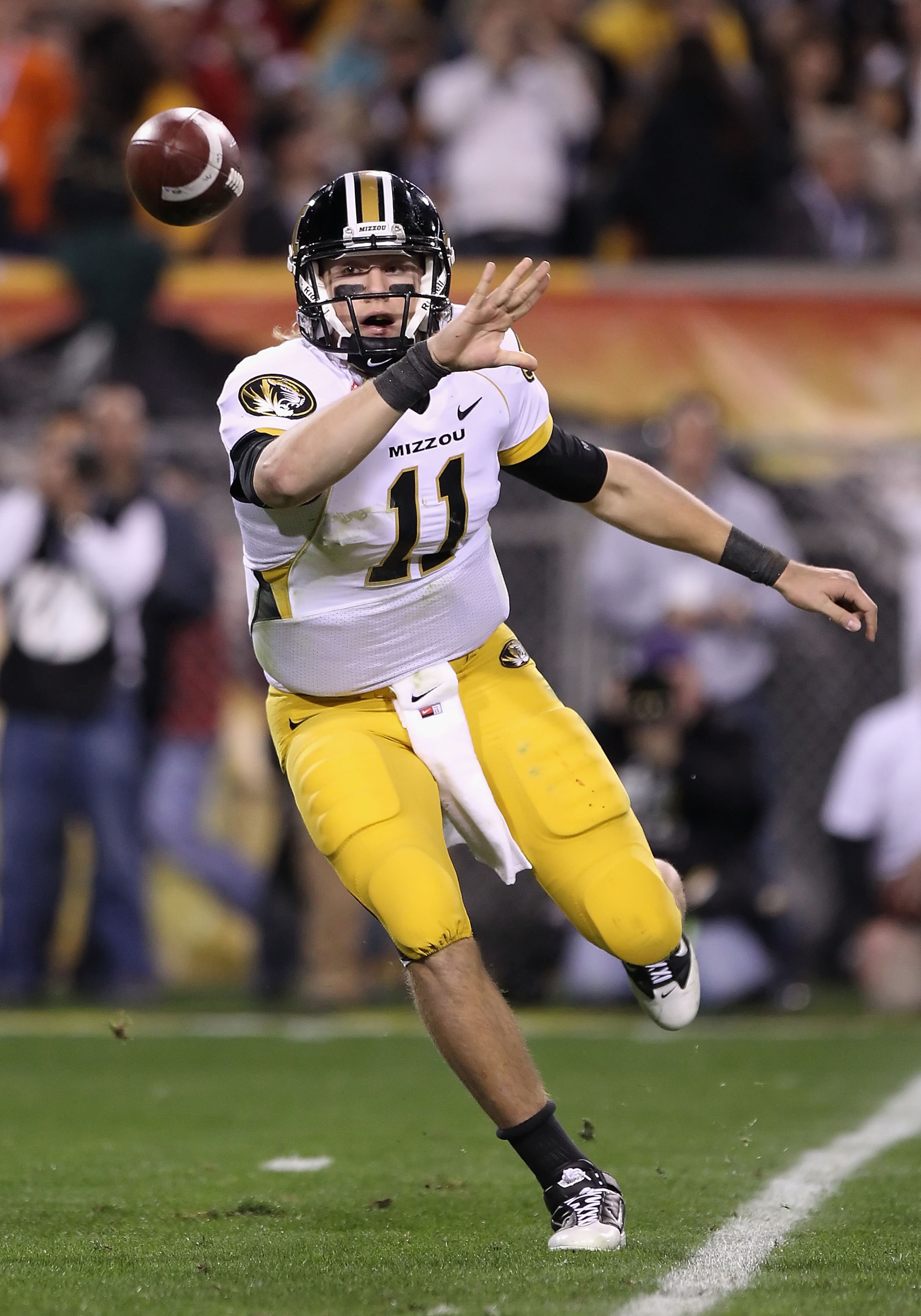 TEMPE, AZ - DECEMBER 28: Quarterback Blaine Gabbert #11 of the Missouri Tigers flips the ball during the Insight Bowl against the Iowa Hawkeyes at Sun Devil Stadium on December 28, 2010 in Tempe, Arizona. (Photo by Christian Petersen/Getty Images) TEMPE, AZ - DECEMBER 28: Quarterback Blaine Gabbert #11 of the Missouri Tigers flips the ball during the Insight Bowl against the Iowa Hawkeyes at Sun Devil Stadium on December 28, 2010 in Tempe, Arizona. (Photo by Christian Petersen/Getty Images)